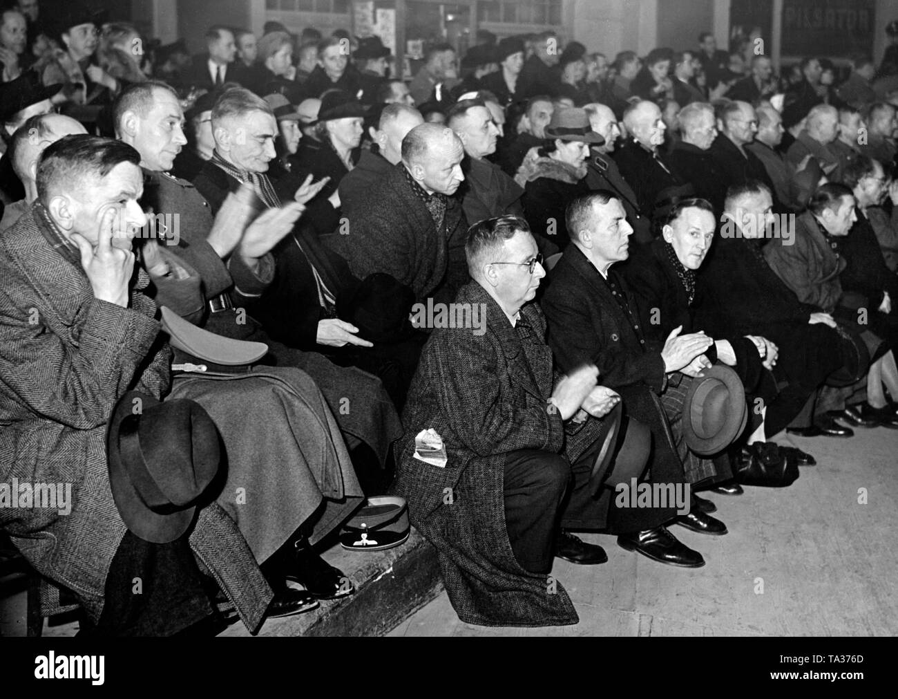 View of the audience at a NSDAP rally in the crowded Sportpalast. Minister of Propaganda Joseph Goebbels gave a speech here. Stock Photo