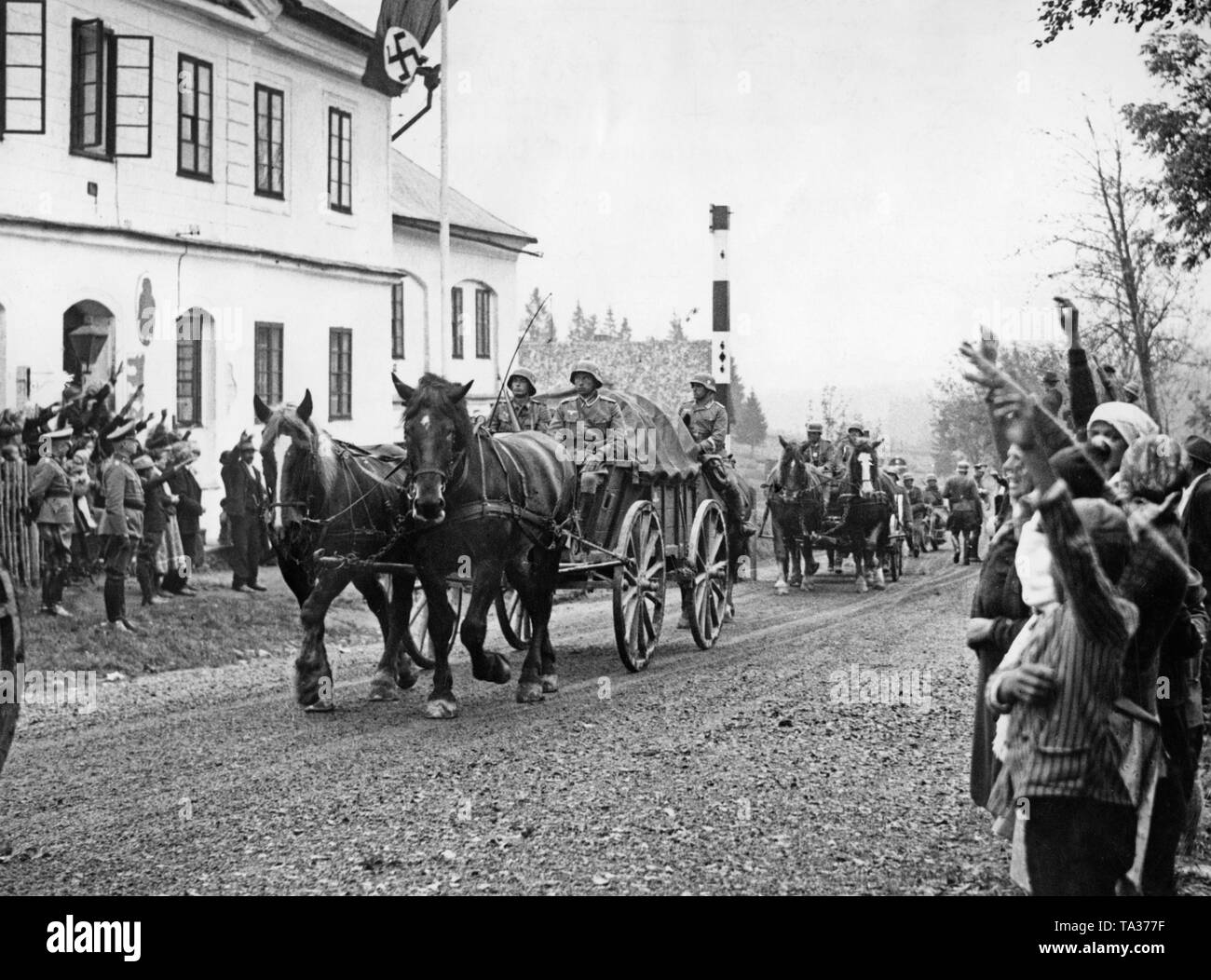 German soldiers cross the former German-Czechoslovak border near Philippsreut on October 1, 1938. Stock Photo