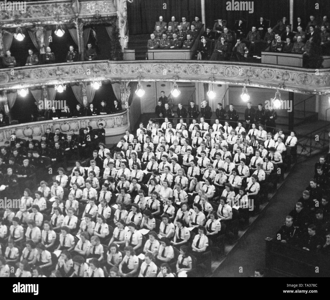 Opening of the youth championships in ice sports in the German State Opera in Prague. After the establishment of the Protectorate of Bohemia and Moravia, sporting events of the Hitler Youth take place in Bohemia and Moravia. Stock Photo