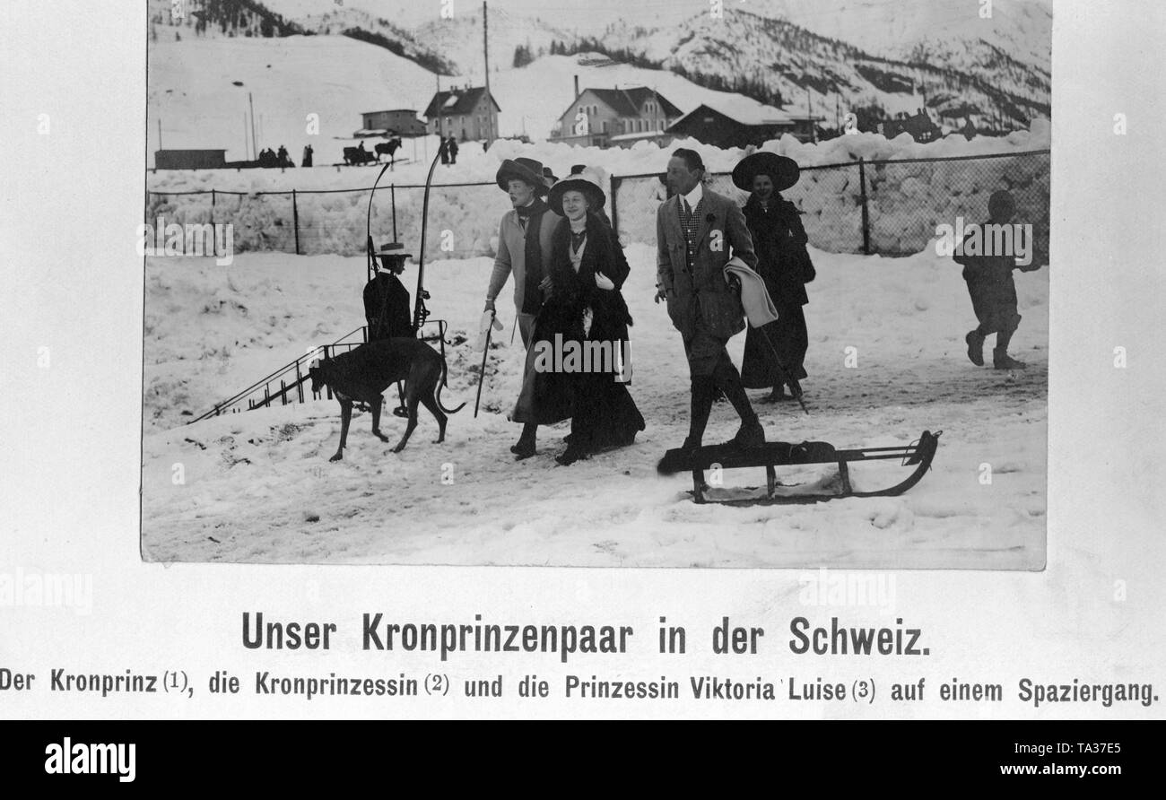 Crown Princess Cecilie of Mecklenburg (left with walking stick), Princess Viktoria Luise of Prussia (mi.) and Crown Prince Wilhelm of Prussia (right with scarf and walking stick) during a walk through the wintry landscape. Stock Photo