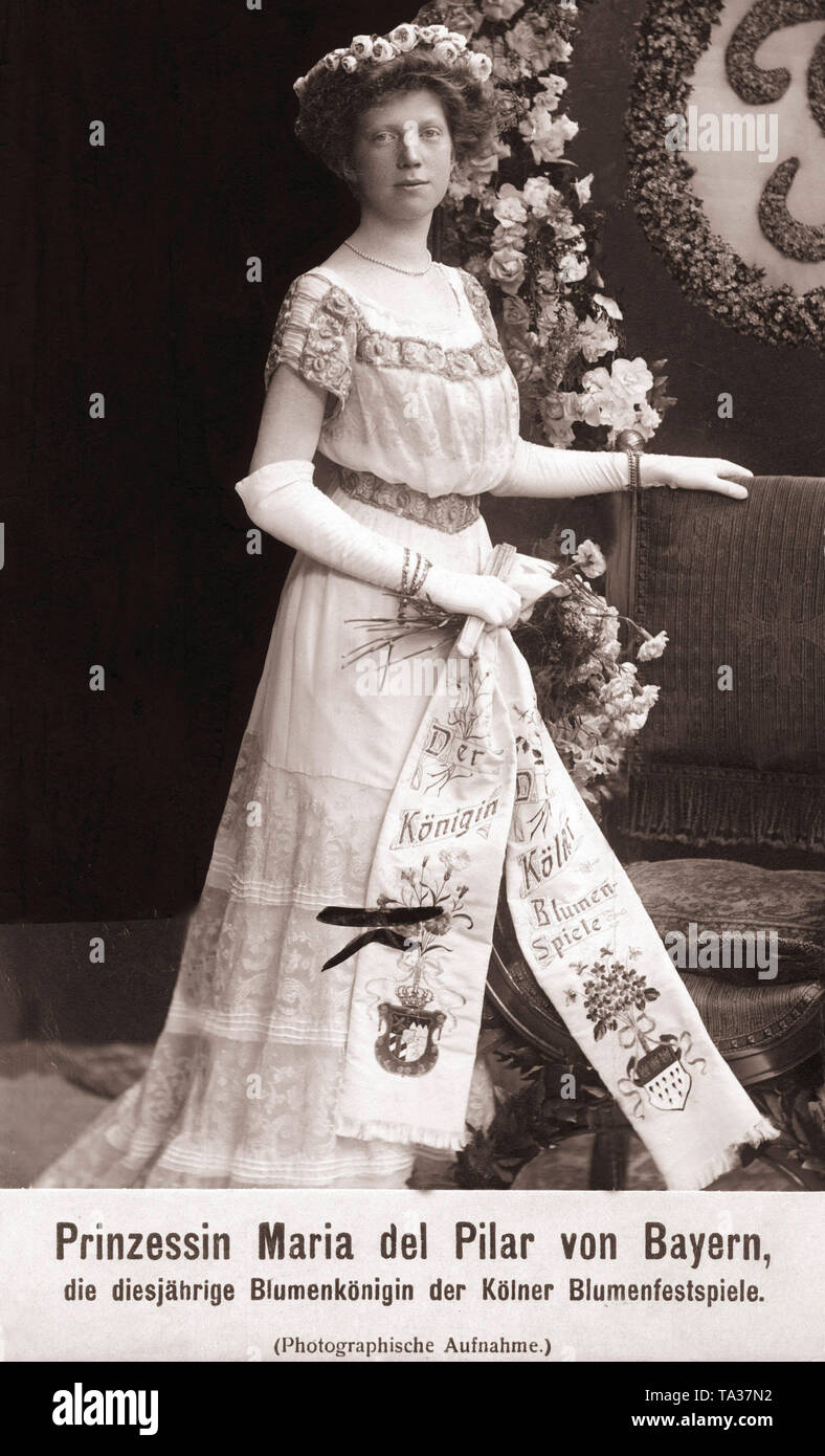This photograph shows Princess Maria del Pilar of Bavaria, daughter of Prince Ludwig-Ferdinand of Bavaria, as Cologne Flower Queen. The ribbon says: 'The Queen of the Cologne Flower Festival.' Stock Photo