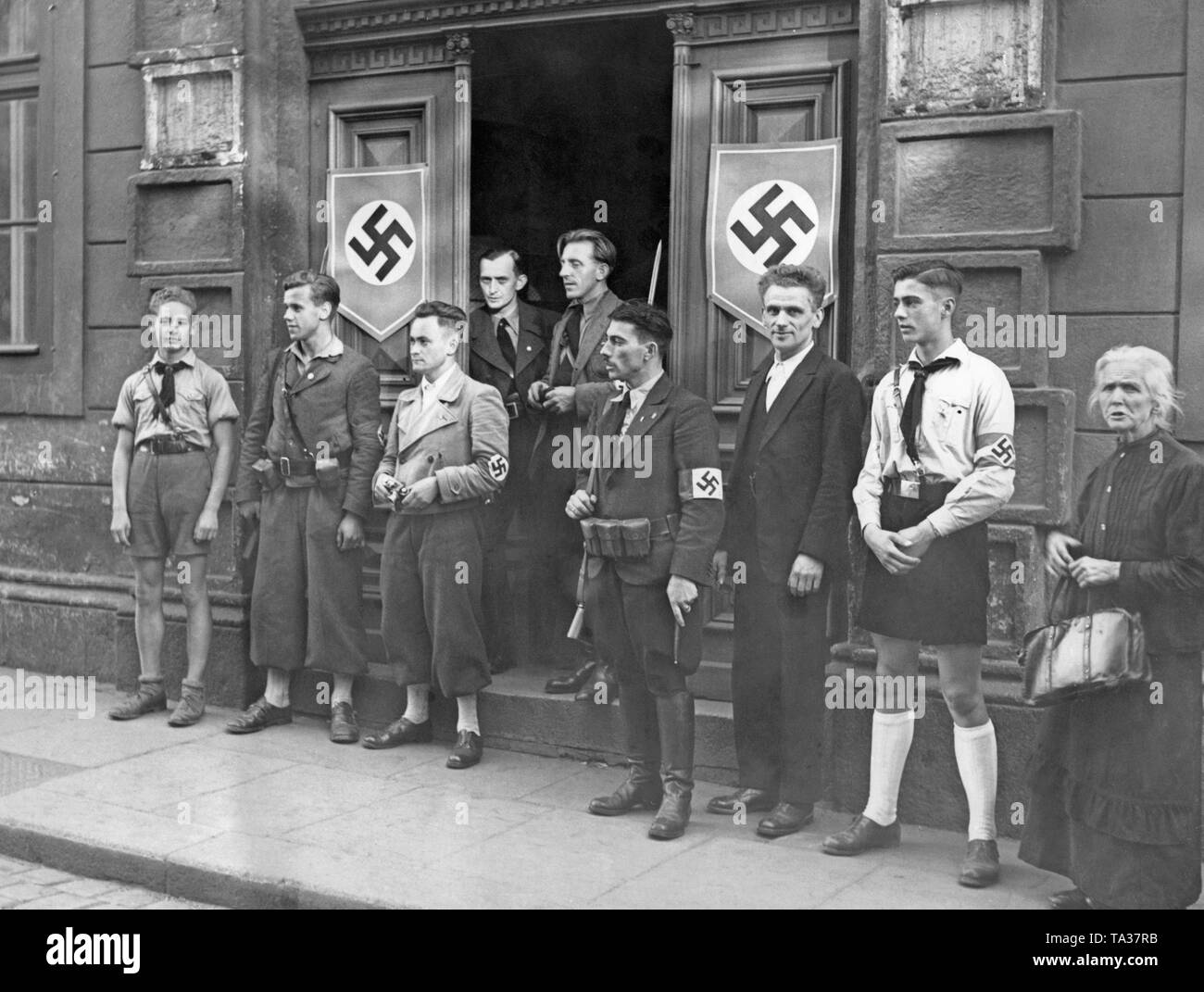Sudeten German police in front of the police station. According to the Munich Agreement in October 1938, Czechoslovakia had to cede the Sudeten German territories to the German Reich. Stock Photo