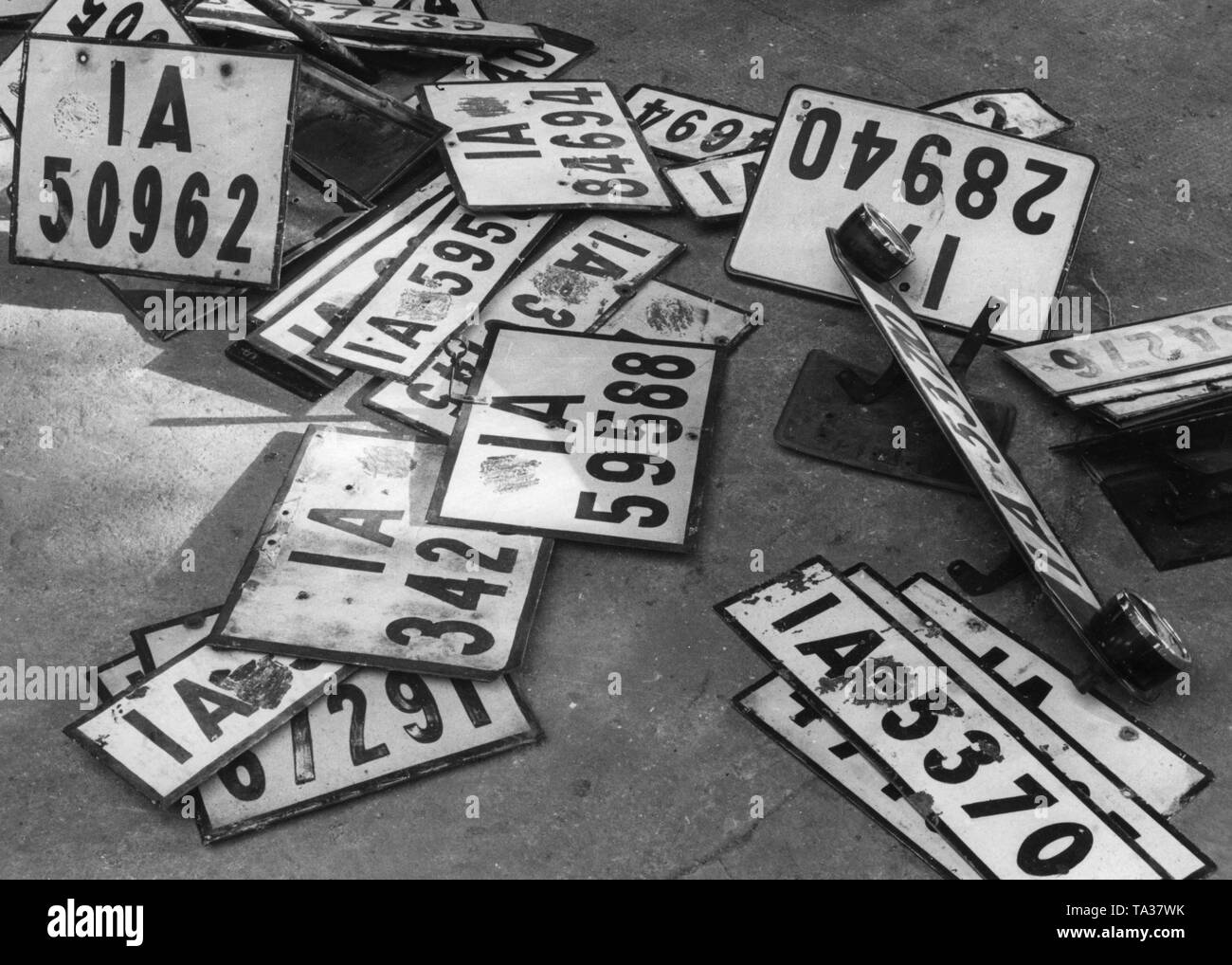 Detached licence plates of the police precinct Berlin (IA). During the economic crisis, more and more people deregistered their car for financial reasons. Stock Photo