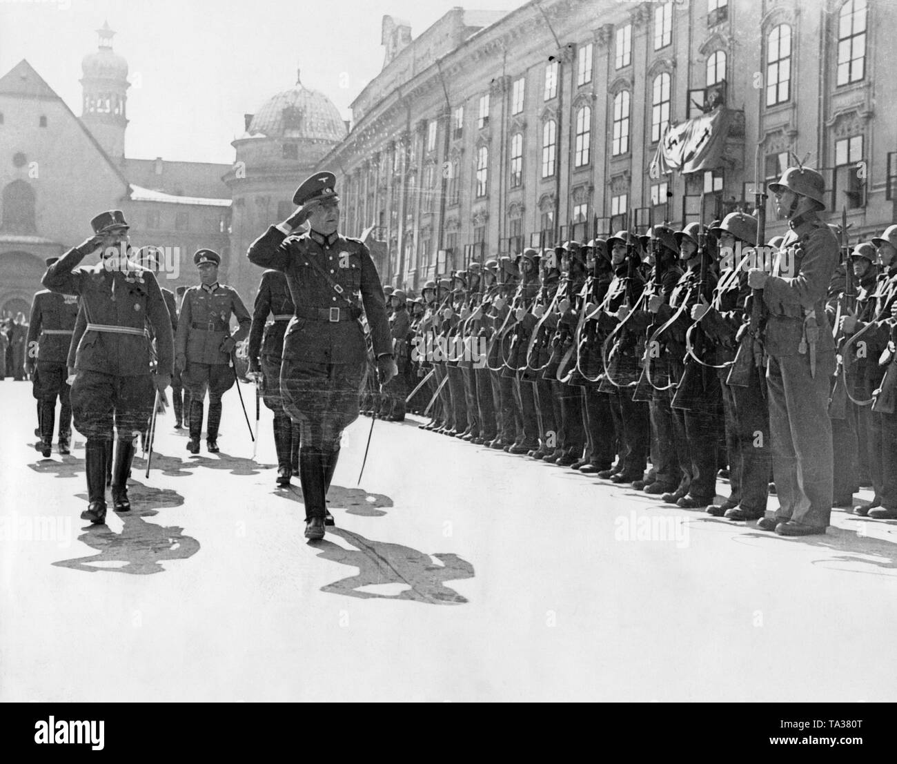 Lieutenant General Doehla and Colonel Egelseer inspect the Tiroler Jaeger-Regiment.  In the course of the annexation of Austria to the German Reich, the Austrian army is sworn in to Adolf Hitler. Stock Photo