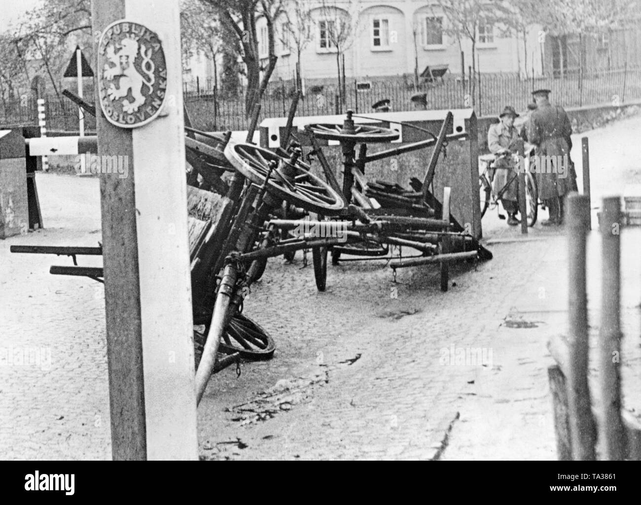 In the course of the May Crisis, Czechs barricade the border at Seifhennersdorf with overturned wagons. After the report on troop movements of the Wehrmacht in Saxony and Bavaria, the Czech government decided for a partial mobilization in the Sudetenland crisis. Stock Photo