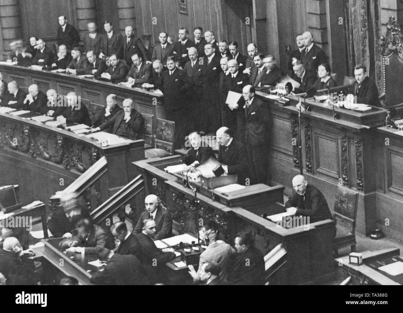 The Center Party politician and Chancellor Heinrich Bruening (standing at the lectern) holds a speech before the deputies. Stock Photo