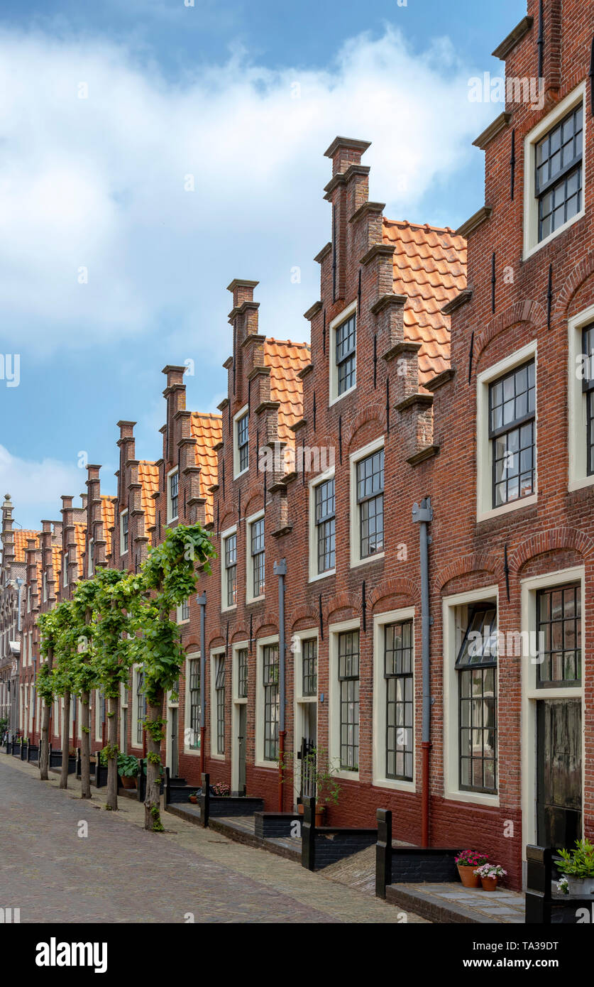 View of the Gasthuis Huisjes, 17th century almshouses with crow-stepped architecture, in the city of Haarlem, North Holland, The Netherlands. Stock Photo