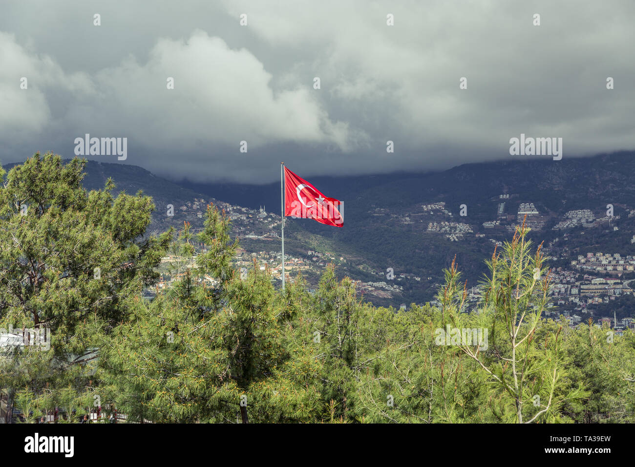 Flag of Turkey against the mountains Stock Photo