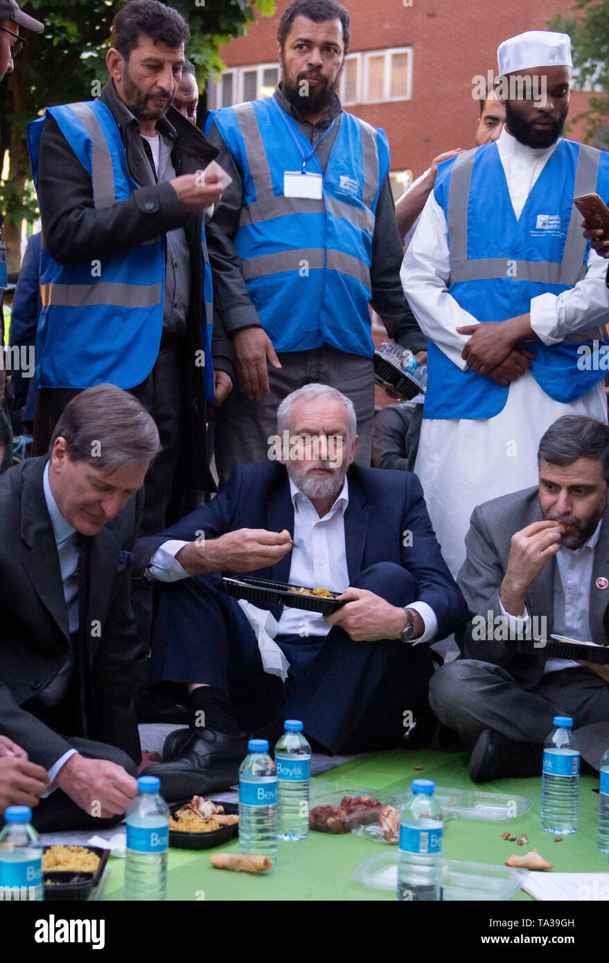 Dominic Grieve and Labour Party leader Jeremy Corbyn join a street iftar meal outside Finsbury Park Mosque in London, on the second anniversary of the Finsbury Park terrorist attack. Stock Photo