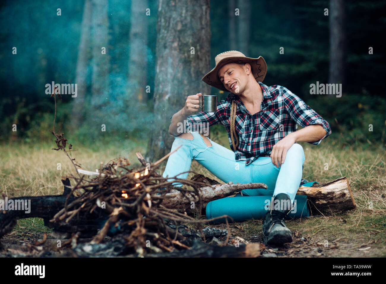 Tourism and hiking concept. Man hiking with overnight stay Stock Photo ...