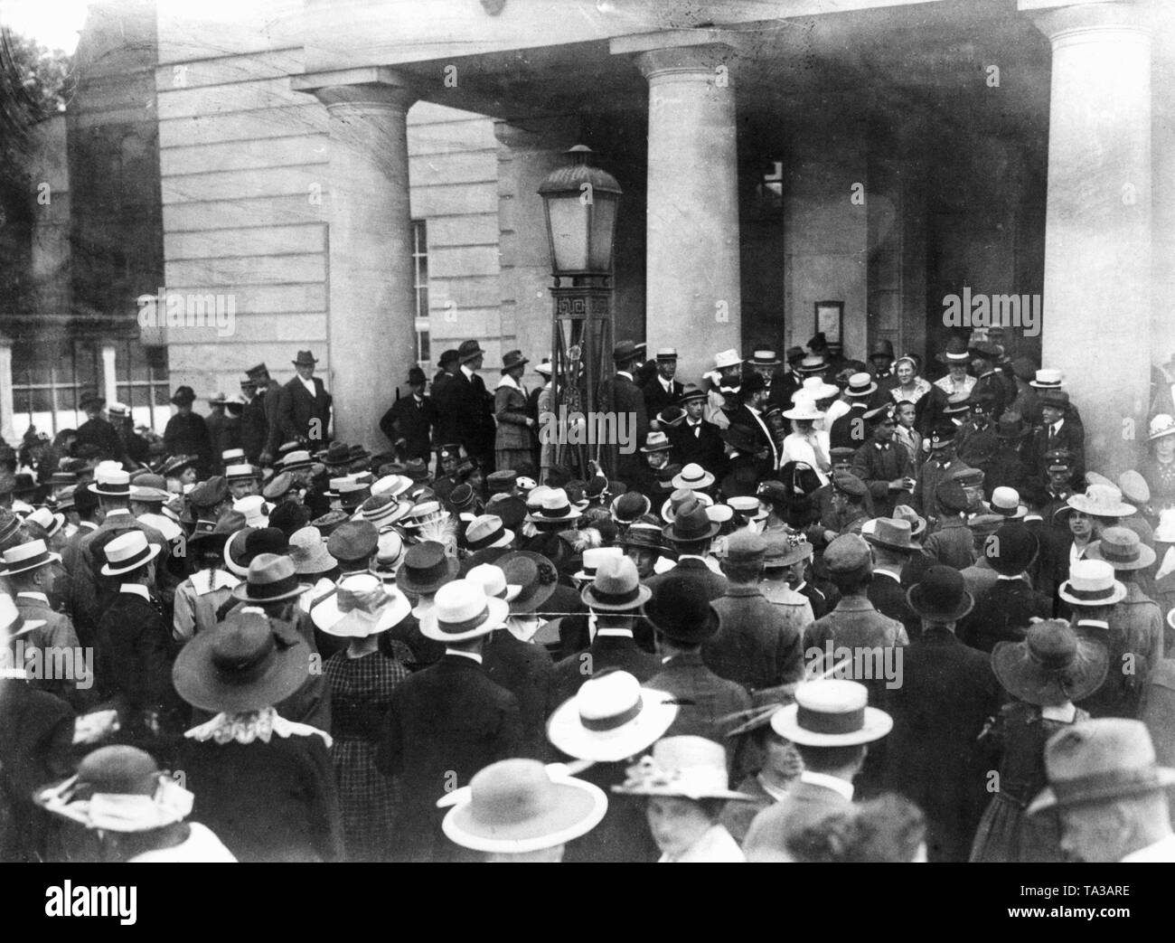 Prime Minister Philipp Heinrich Scheidemann speaks against the adoption of the Versailles Treaty. This dispute led to the break-up of the first government of the new republic and remained an everlasting issue until 1933. This photograph shows the agitated people waiting in front of the National Theater. Stock Photo