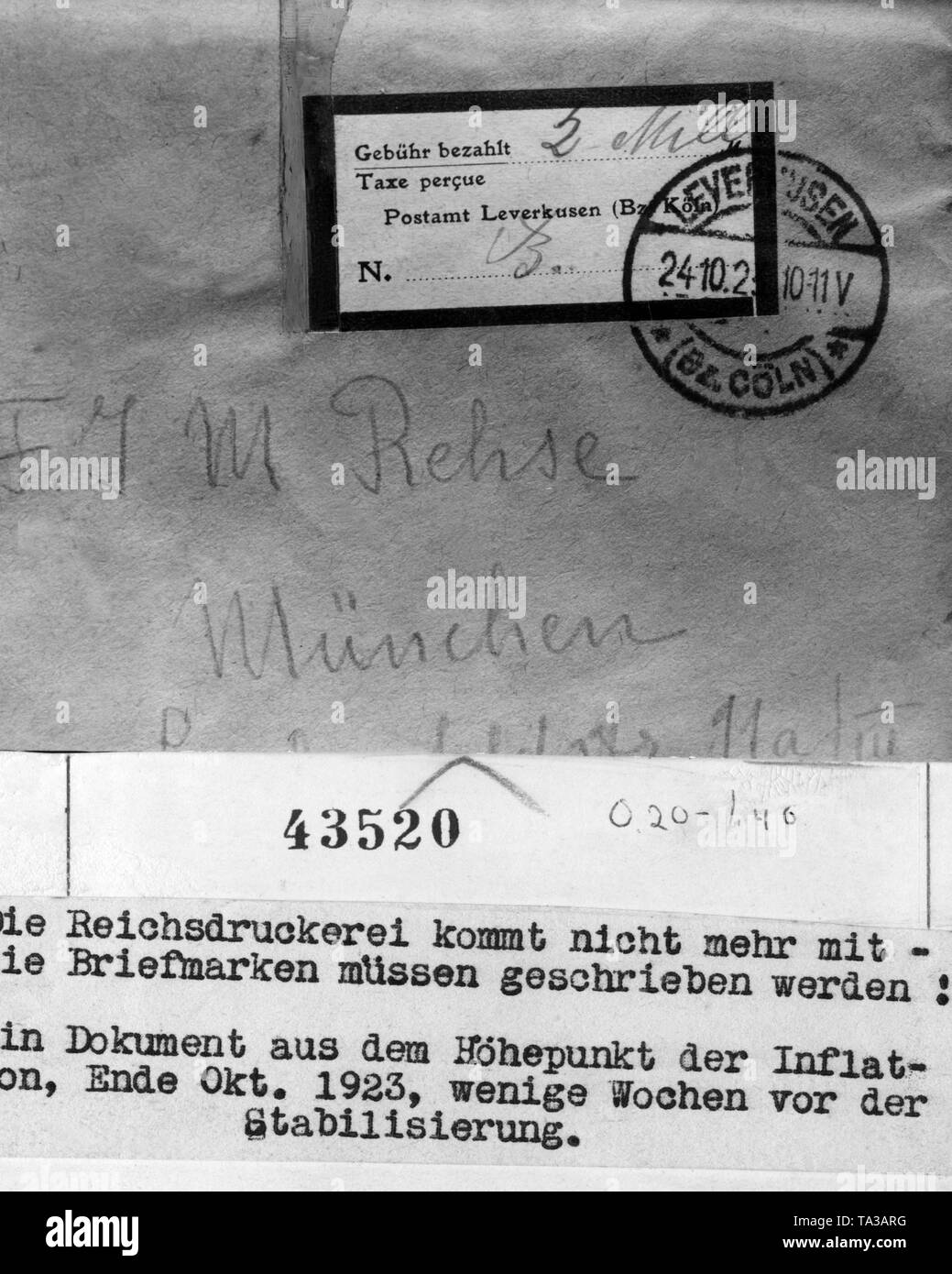 The post has to write stamps with value, here 2 million Marks, on the letters, since the Reichsdruckerei (Reich Printing Office) could not keep up with the depreciation of money and stamps. Stock Photo