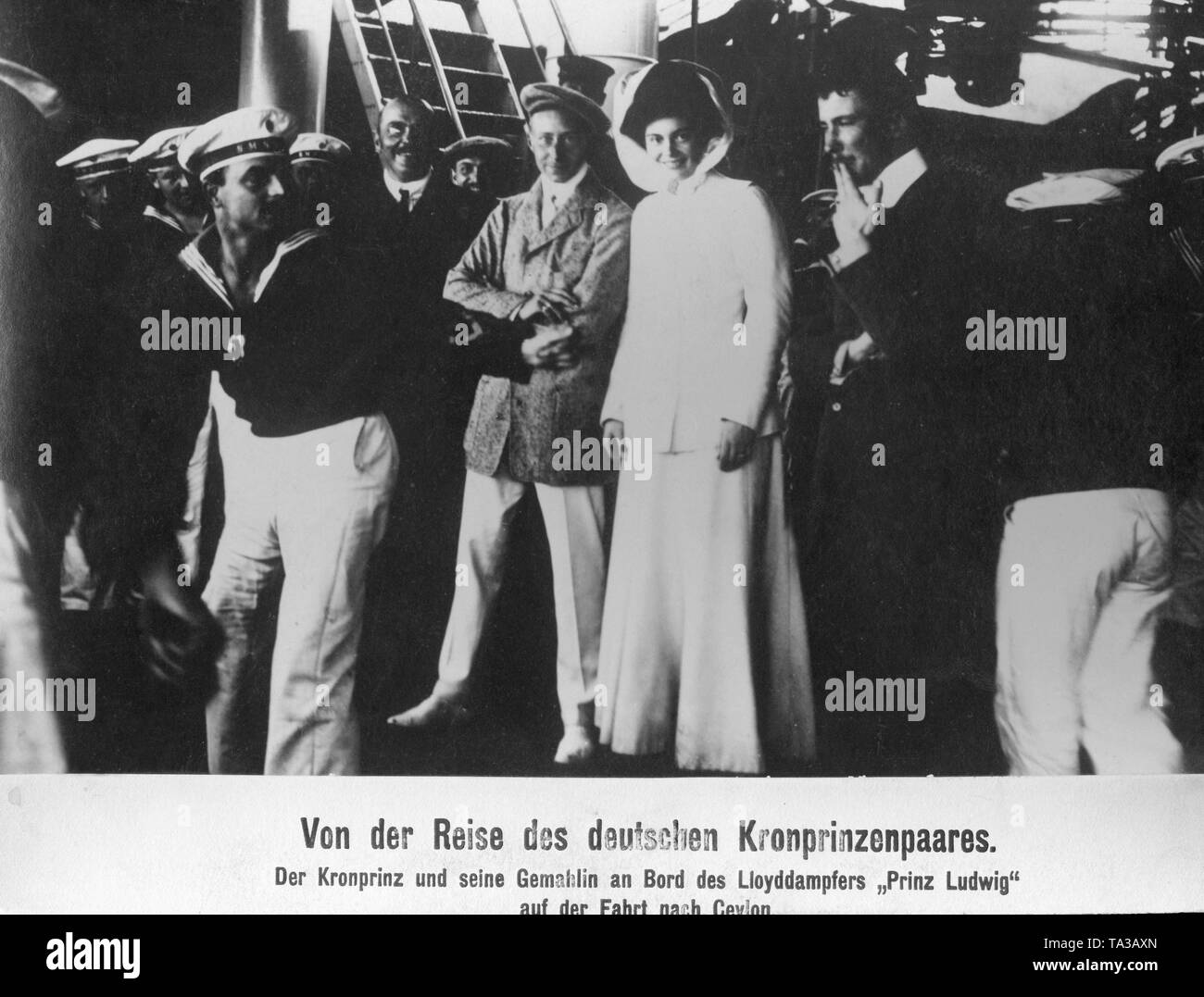 Crown Prince Wilhelm of Prussia (middle, in civilian) and Crown Princess Cecilie of Mecklenburg (center) aboard the Lloyd steamer 'Prinz Ludwig' on the way to Ceylon (now Sri Lanka). Stock Photo