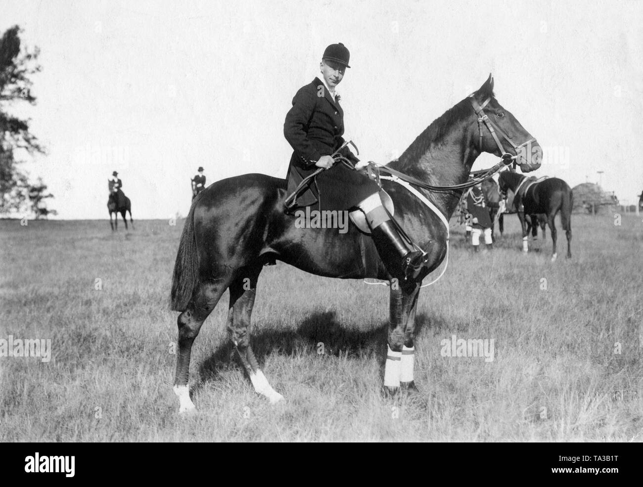 Crown Prince Wilhelm during a hunting trip on his horse. Stock Photo