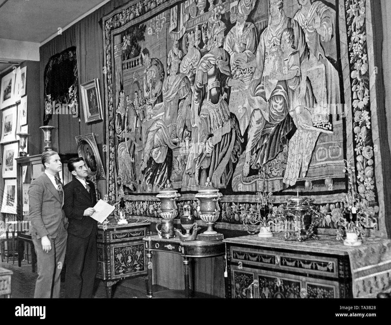 A tapestry owned by Peter the Great is auctioned in New York City. The Soviet government had to sell art treasures from the tsarist period to obtain foreign currency repeatedly. Stock Photo