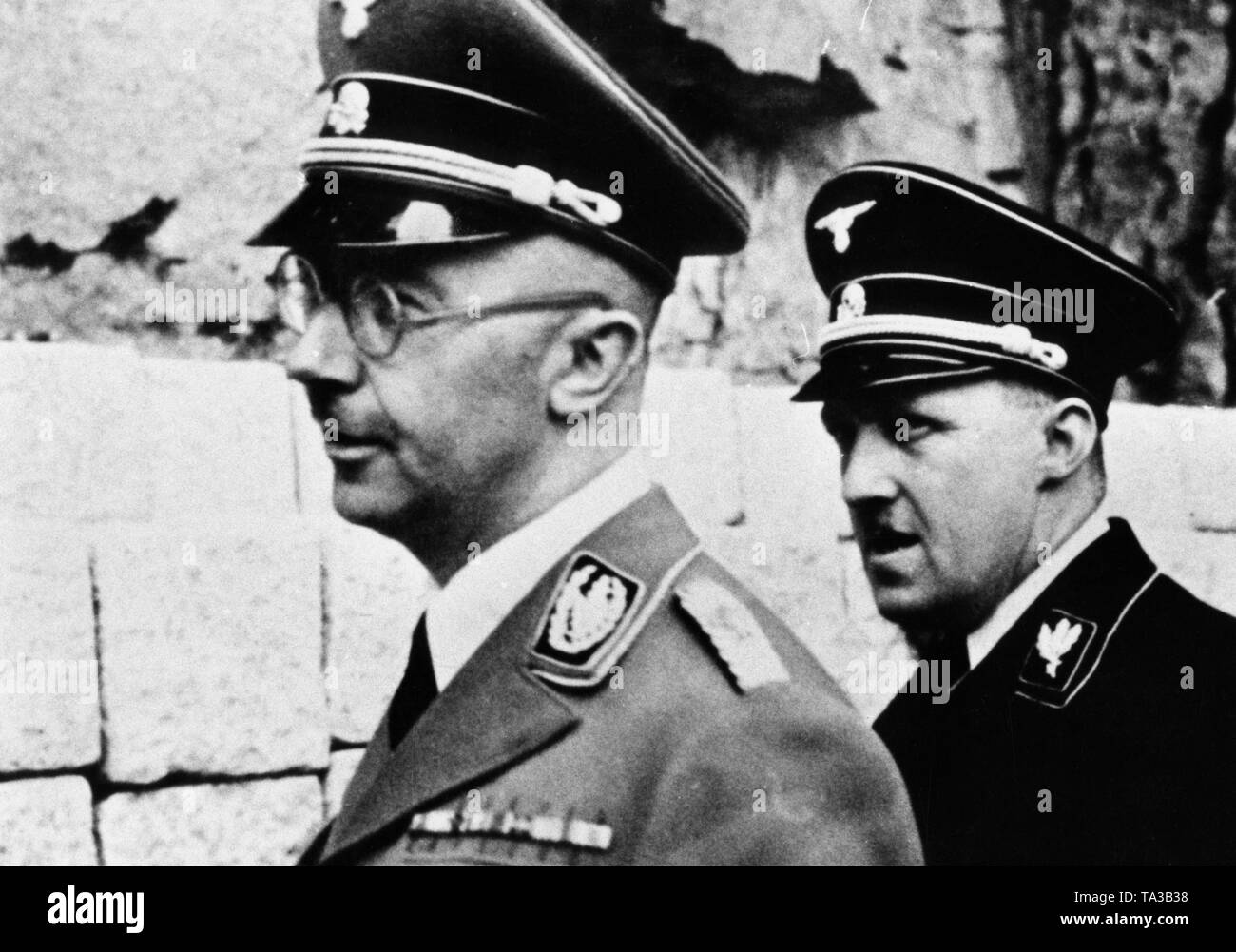 Heinrich Himmler (left) and the Nazi Gauleiter of the Reichsgau Oberdonau, August Eigruber, inspect the Mauthausen concentration camp. Stock Photo