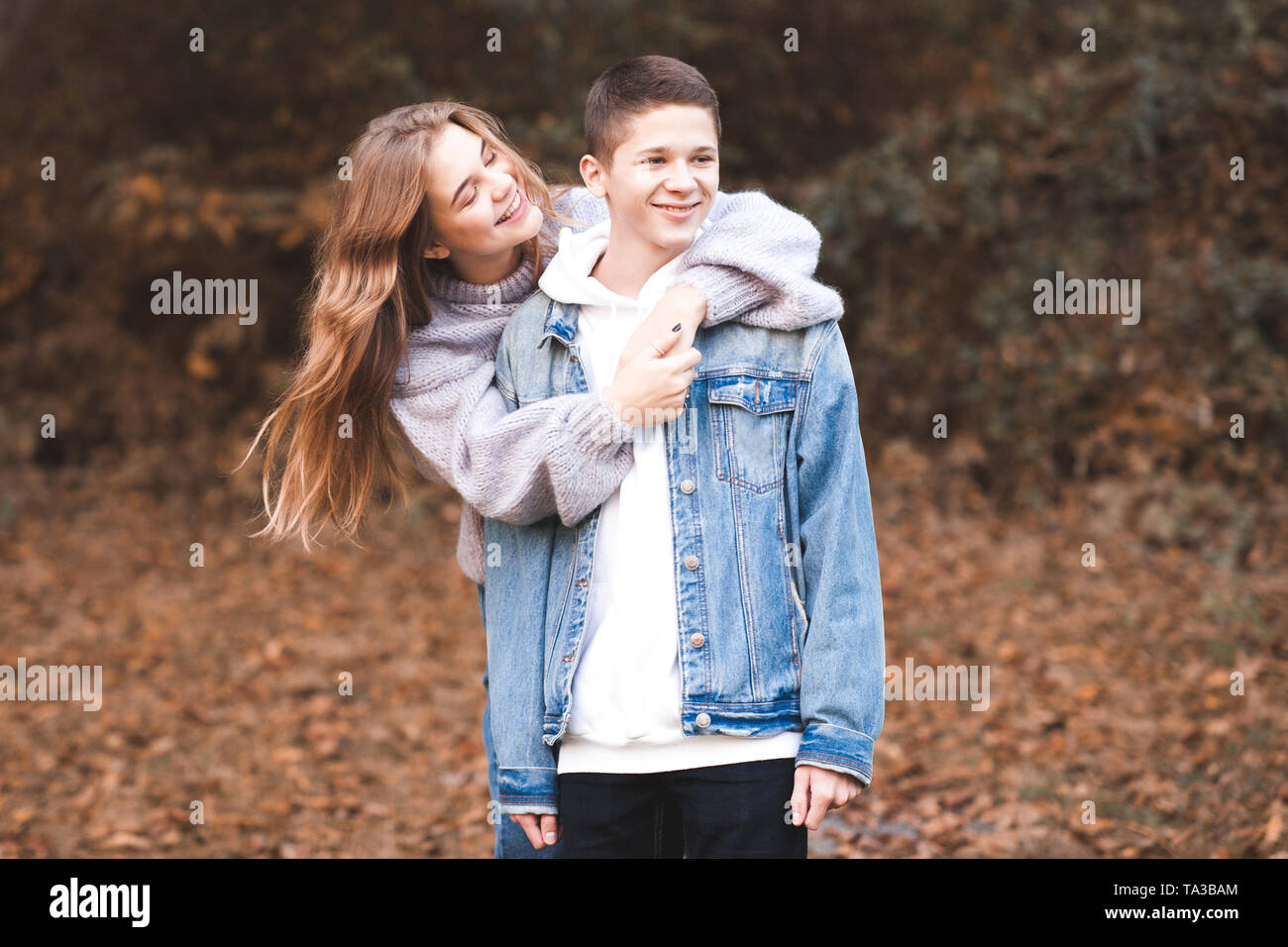 Happy Love Teen Couple Having Fun Outdoors Wearing Stylish Denim Clothes Valentines Day Stock Photo Alamy