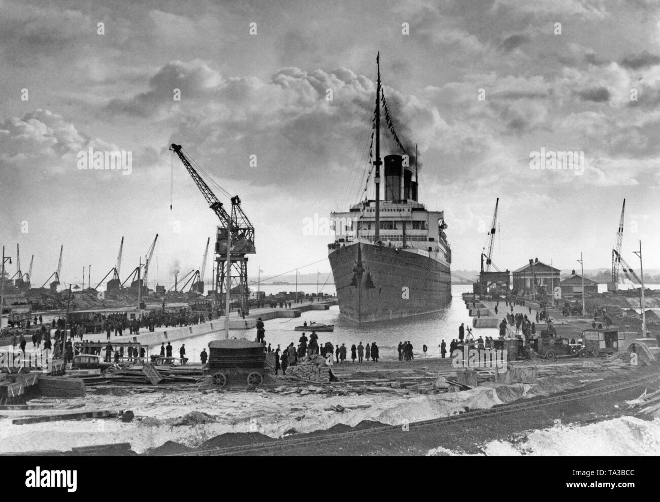 The 'Majestic' of the White Star Line is the first civilian ship to use the King George V Dock in Southampton. Stock Photo
