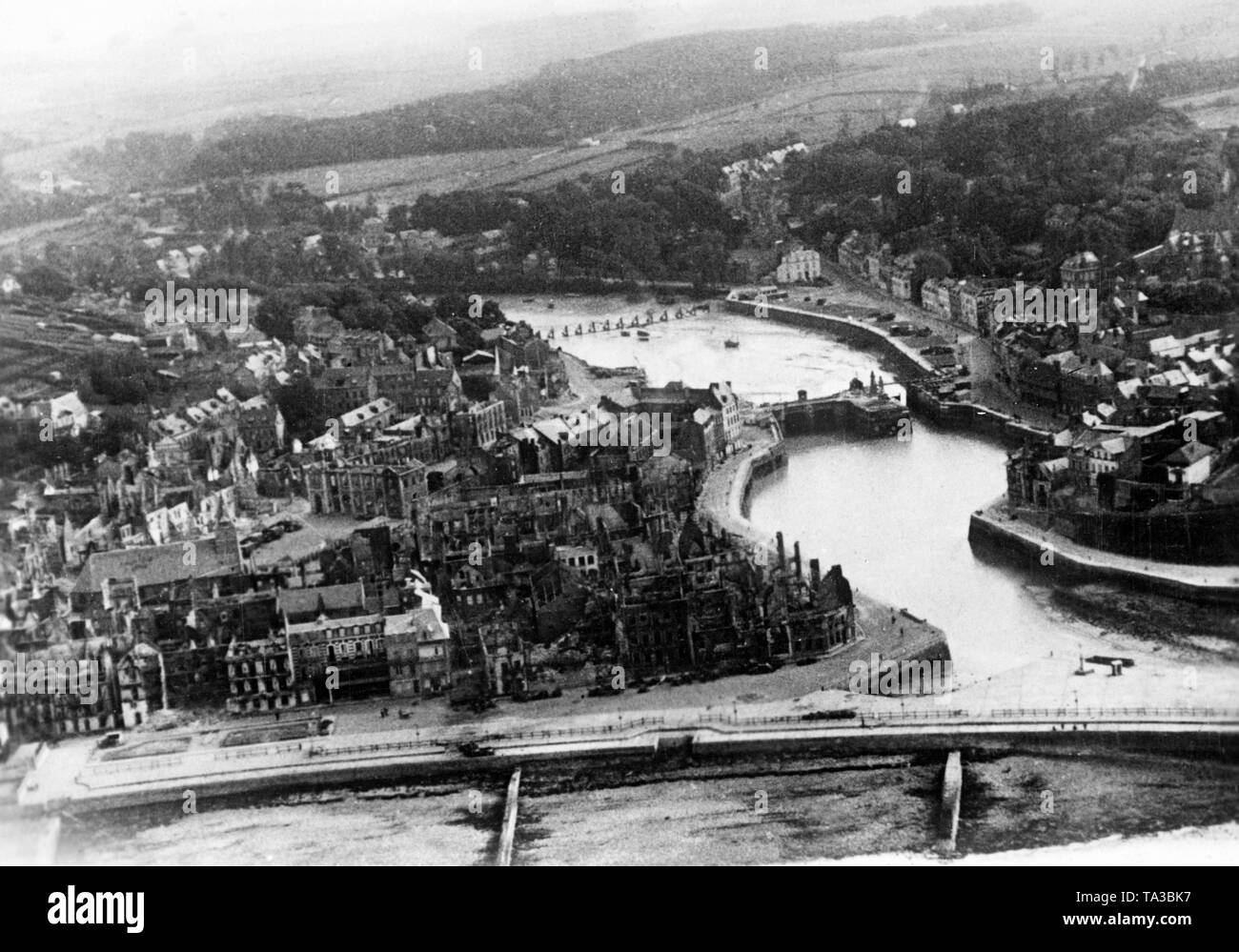 View from a German fighter onto a French port community. Luftwaffe bombers destroyed the locks. Photo: war correspondent Wundshammer. Stock Photo