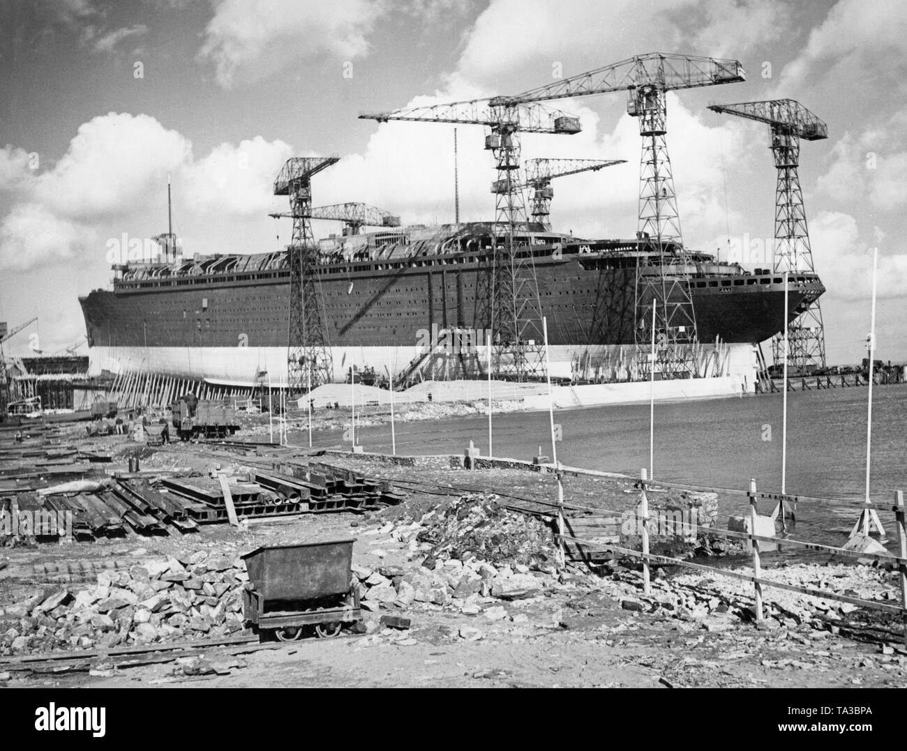 The "Normandie" structurally complete shortly before her launch at the shipyard Chantiers de l 'Atlantique in Saint Nazaire. Stock Photo