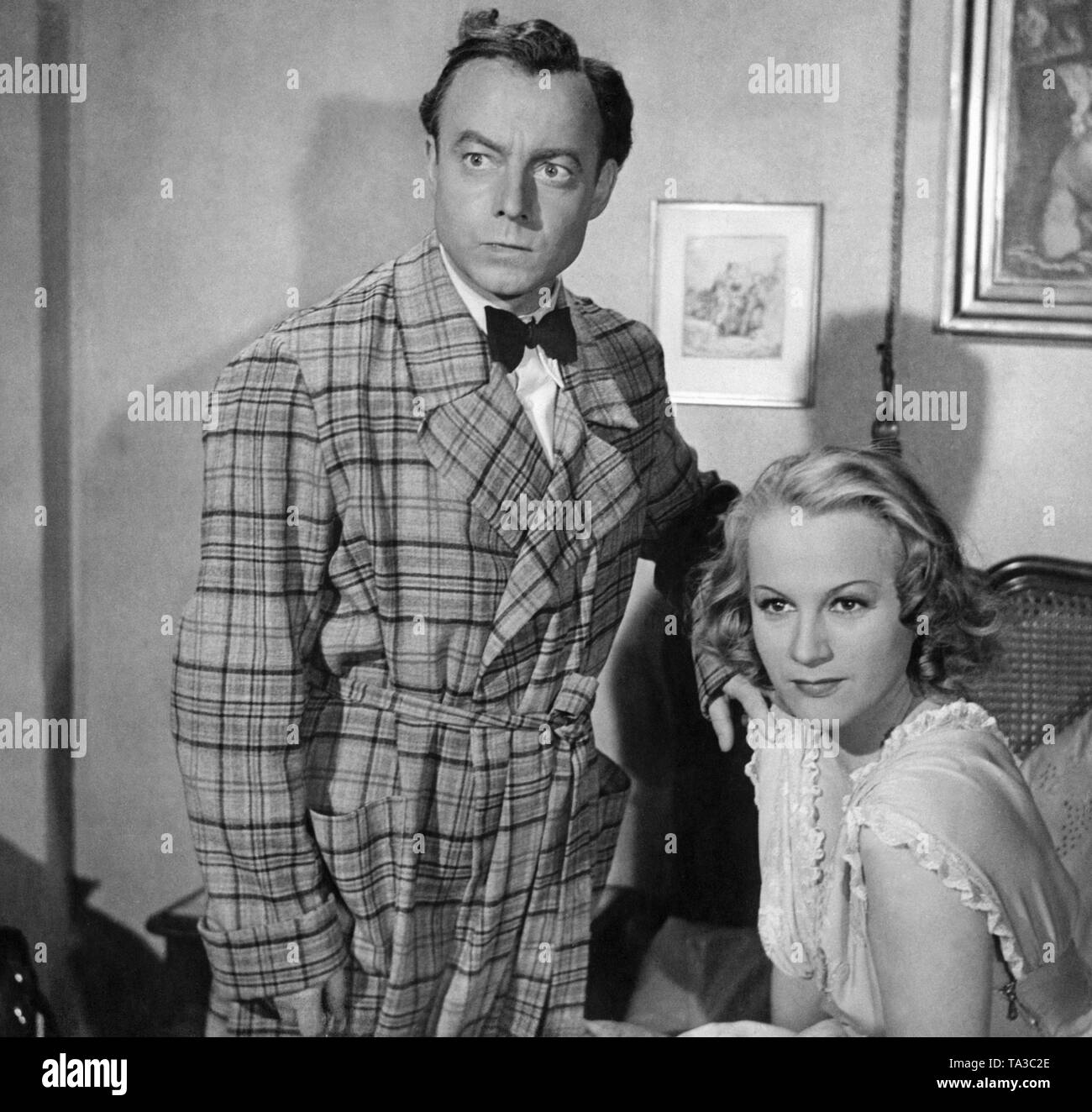 Heinz Ruehmann as Peter Trost and Lil Adina as Ellinor Deinhardt in 