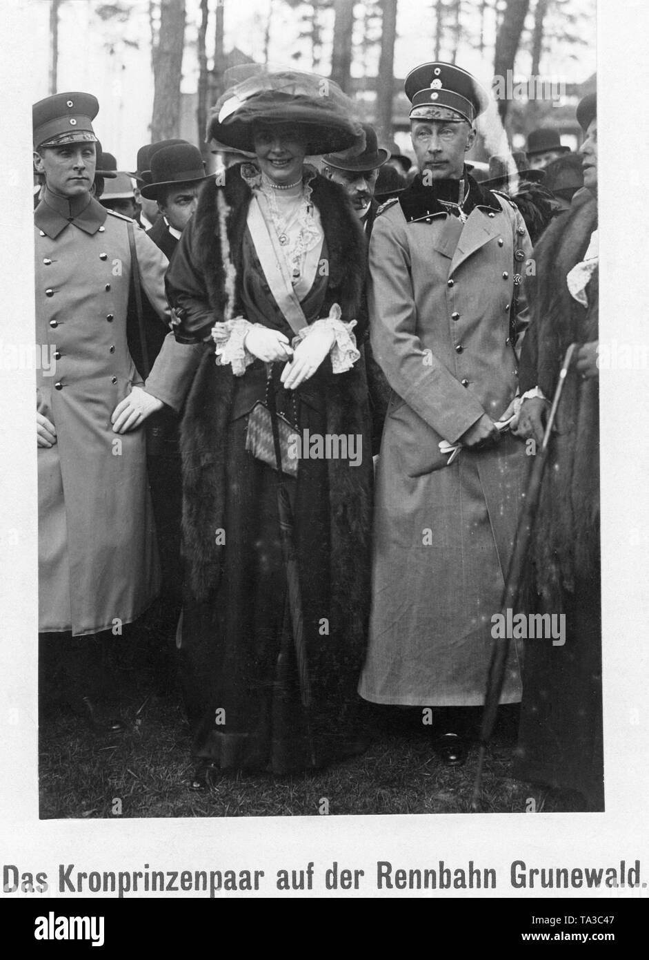 Crown Princess Cecilie (left) together with her husband Crown Prince Wilhelm of Prussia (right) on a racecourse in Berlin-Grunewald. Stock Photo