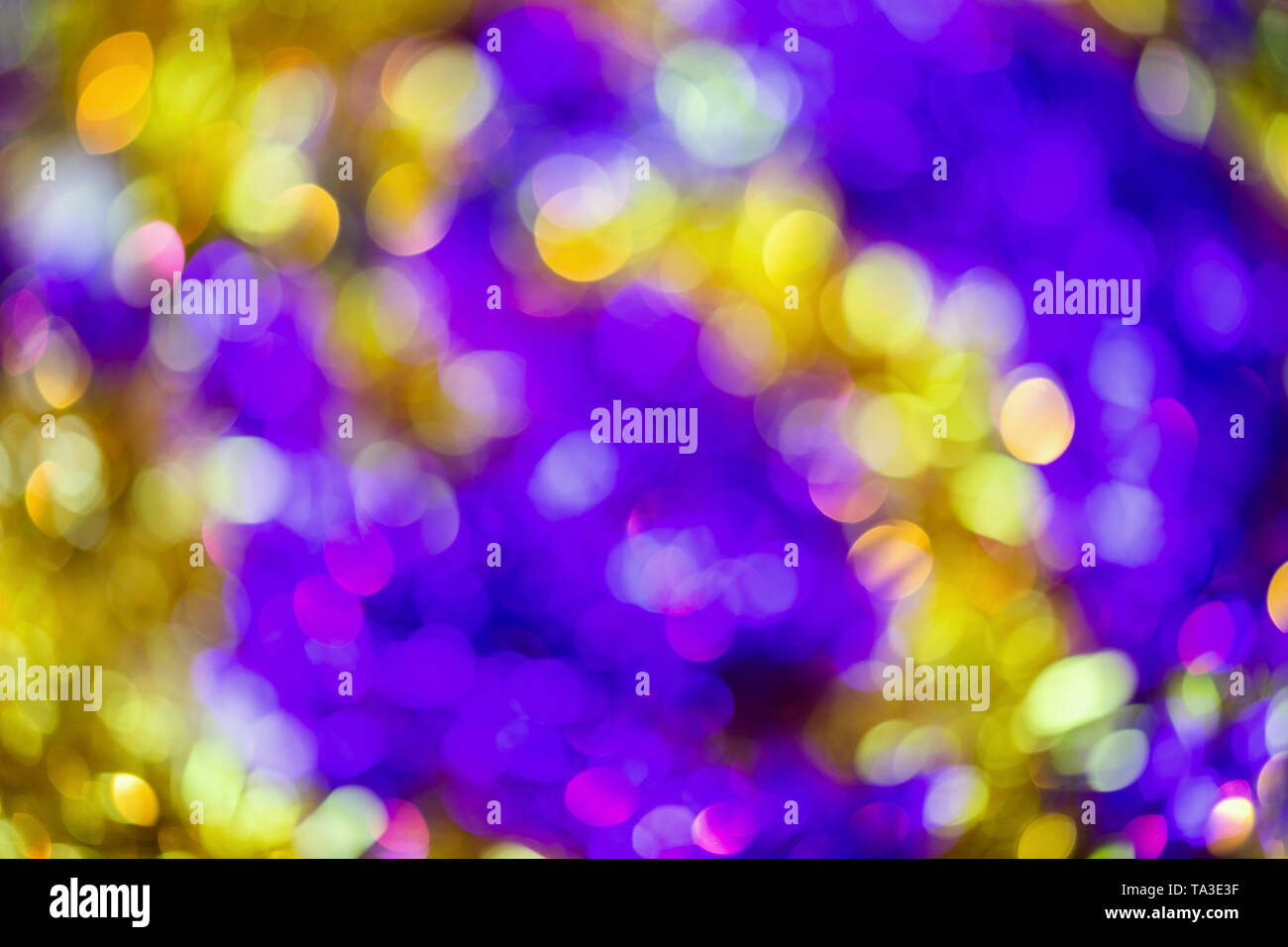 natural optic violetyellow lens blur abstract background Stock Photo