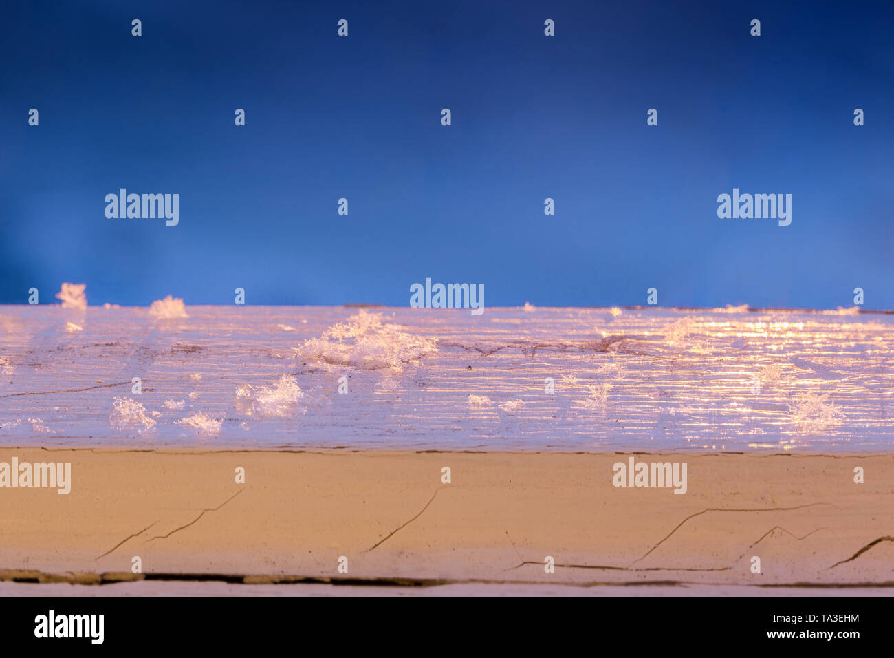 snow flakes on old painted wood with selective focus Stock Photo - Alamy