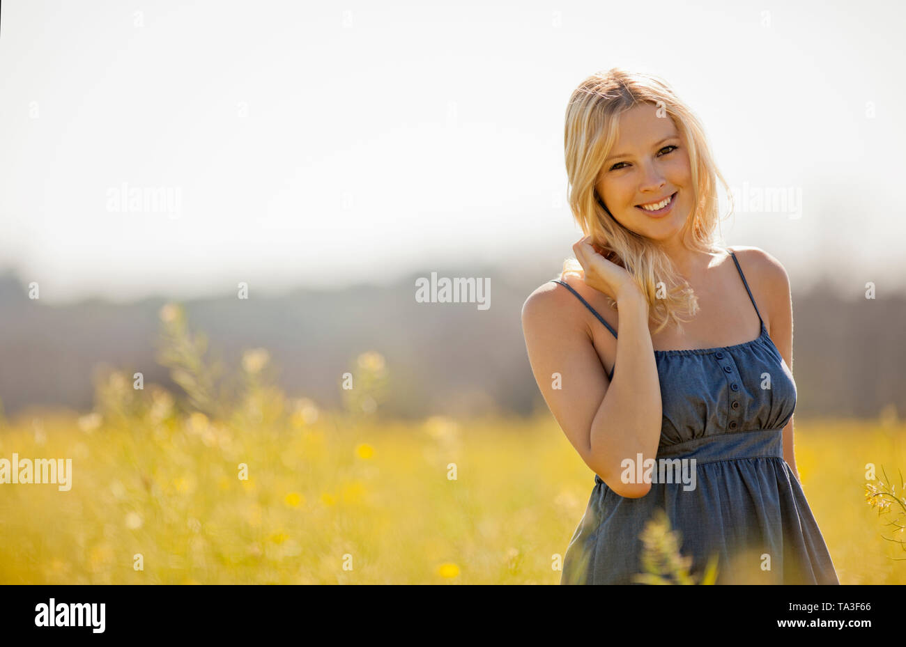 Woman in blue dress outdoors hi-res stock photography and images - Alamy
