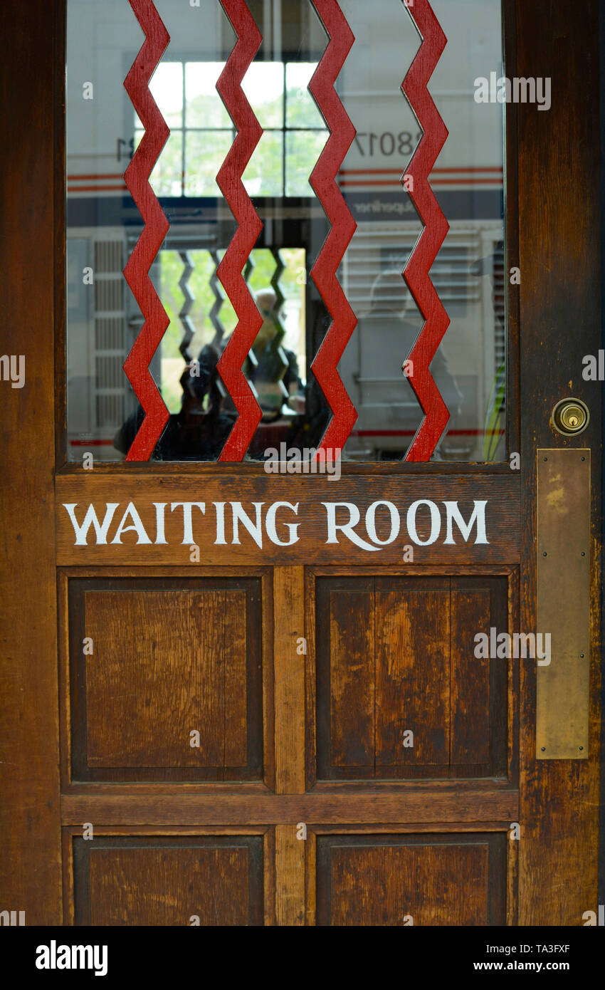 An entrance door to the waiting room at the historic railroad depot in Lamy, New Mexico USA Stock Photo