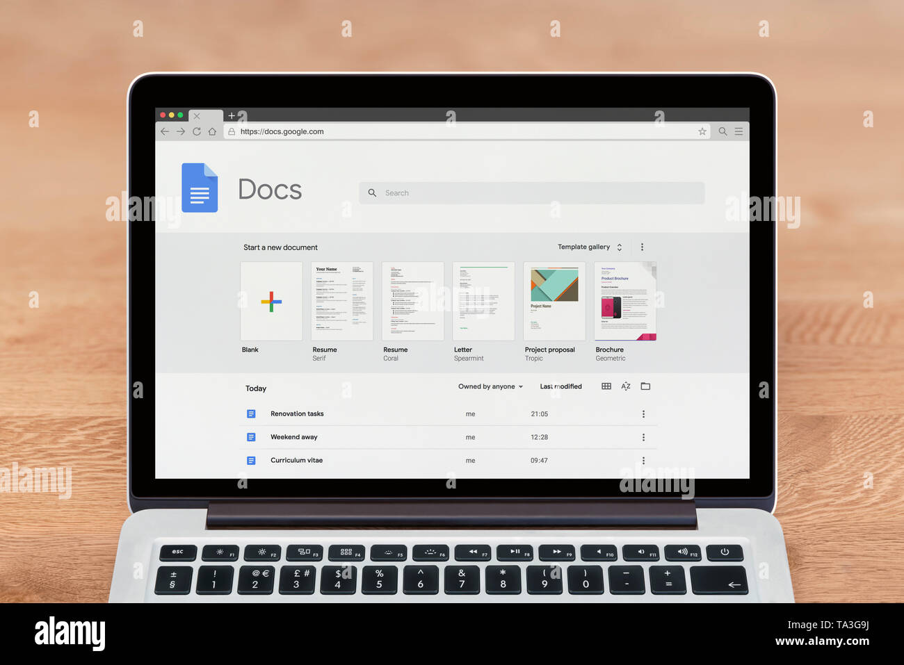 An Apple Macbook displays the Google Docs website (Editorial use only). Stock Photo