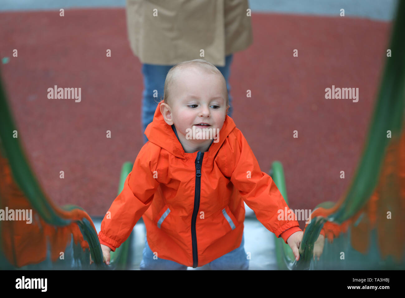 Baby raincoat hires stock photography and images Alamy