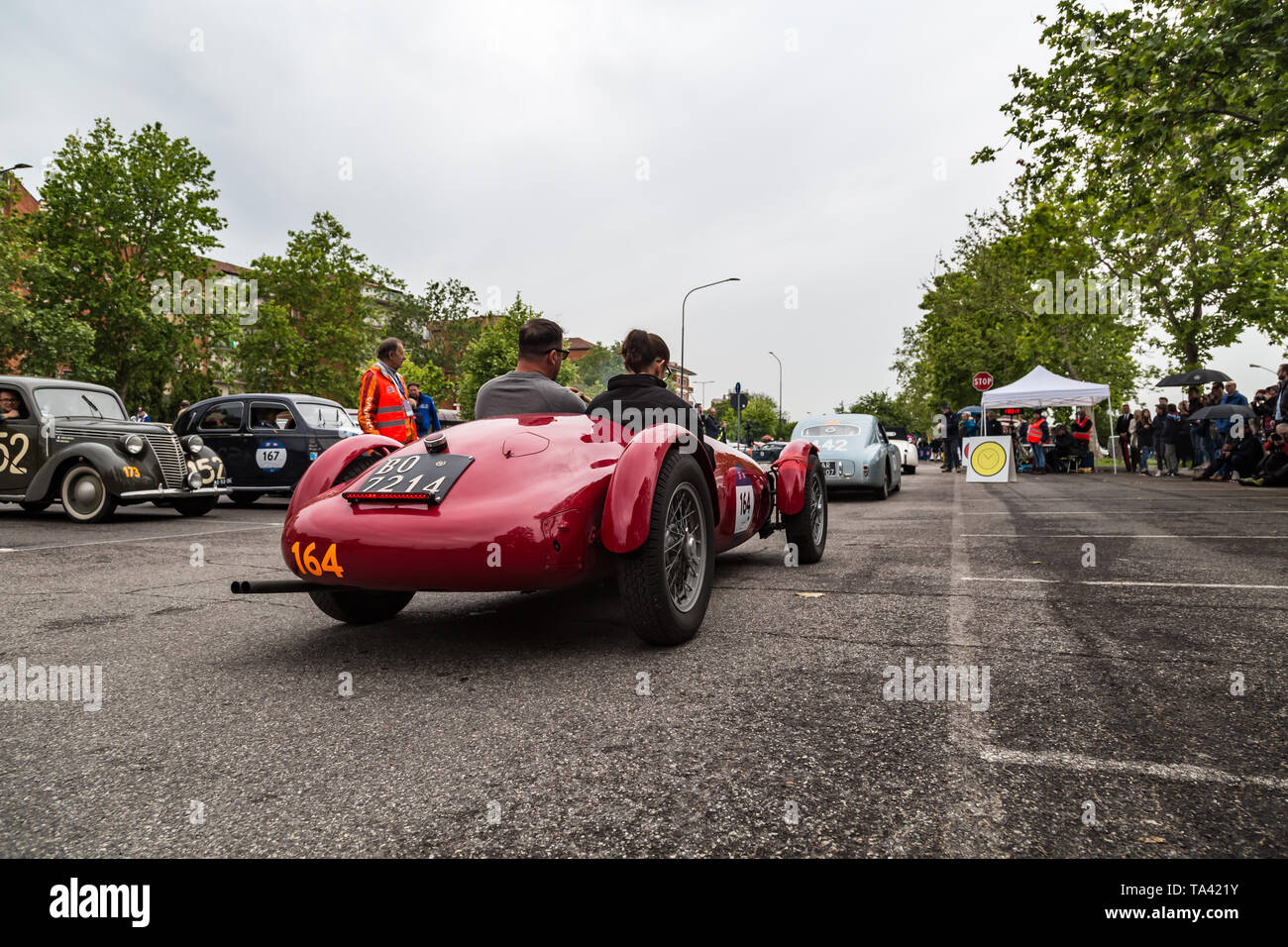 Old Italian Racing Brescia, Italy - May 18, 2019: Triumphant entry of the classic Italian ...