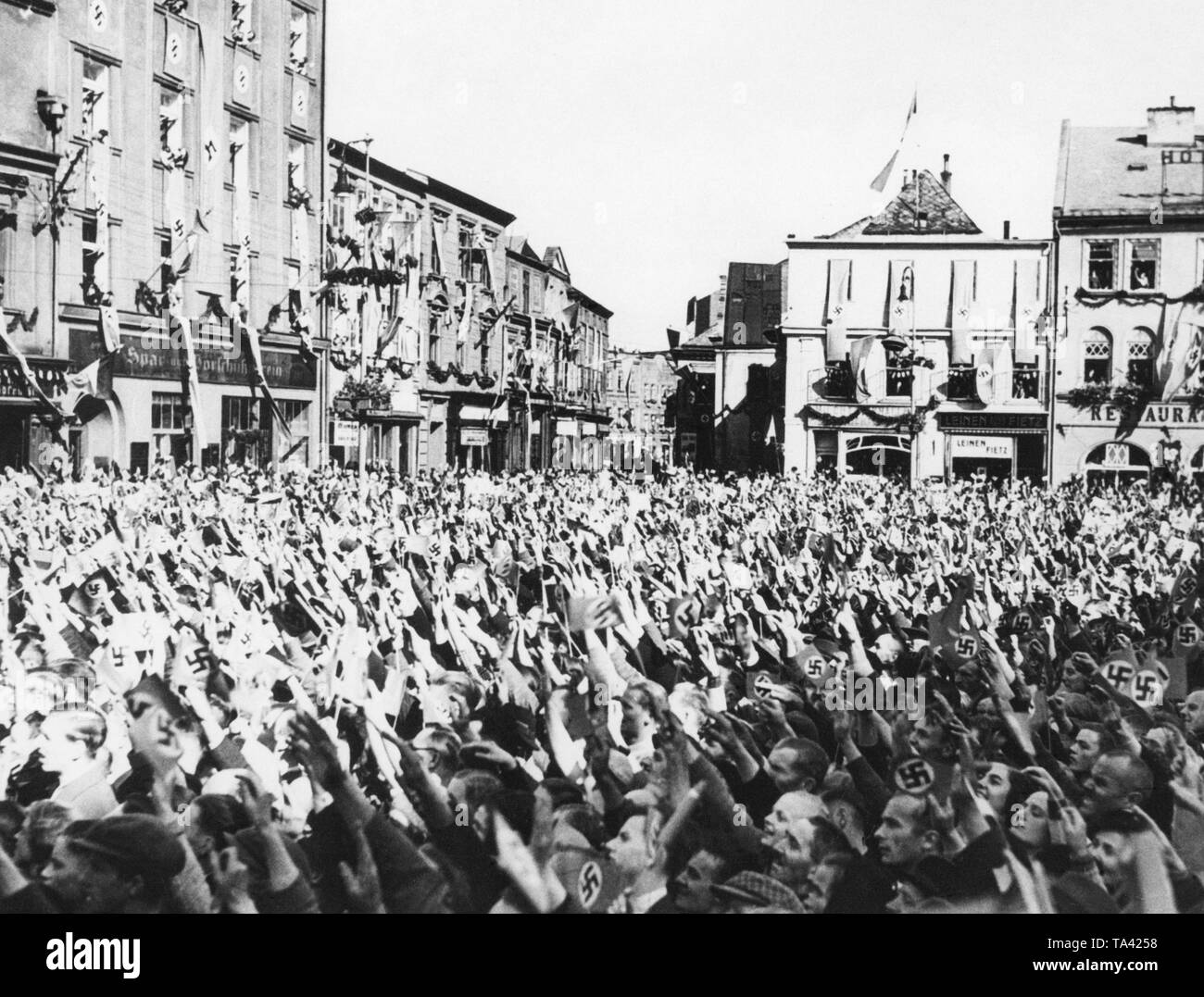 View of the townhall square of Jaegerndorf (today Krnov) on October 7, 1938, while Adolf Hitler is giving a speech during the occupation of the Sudetenland. Stock Photo