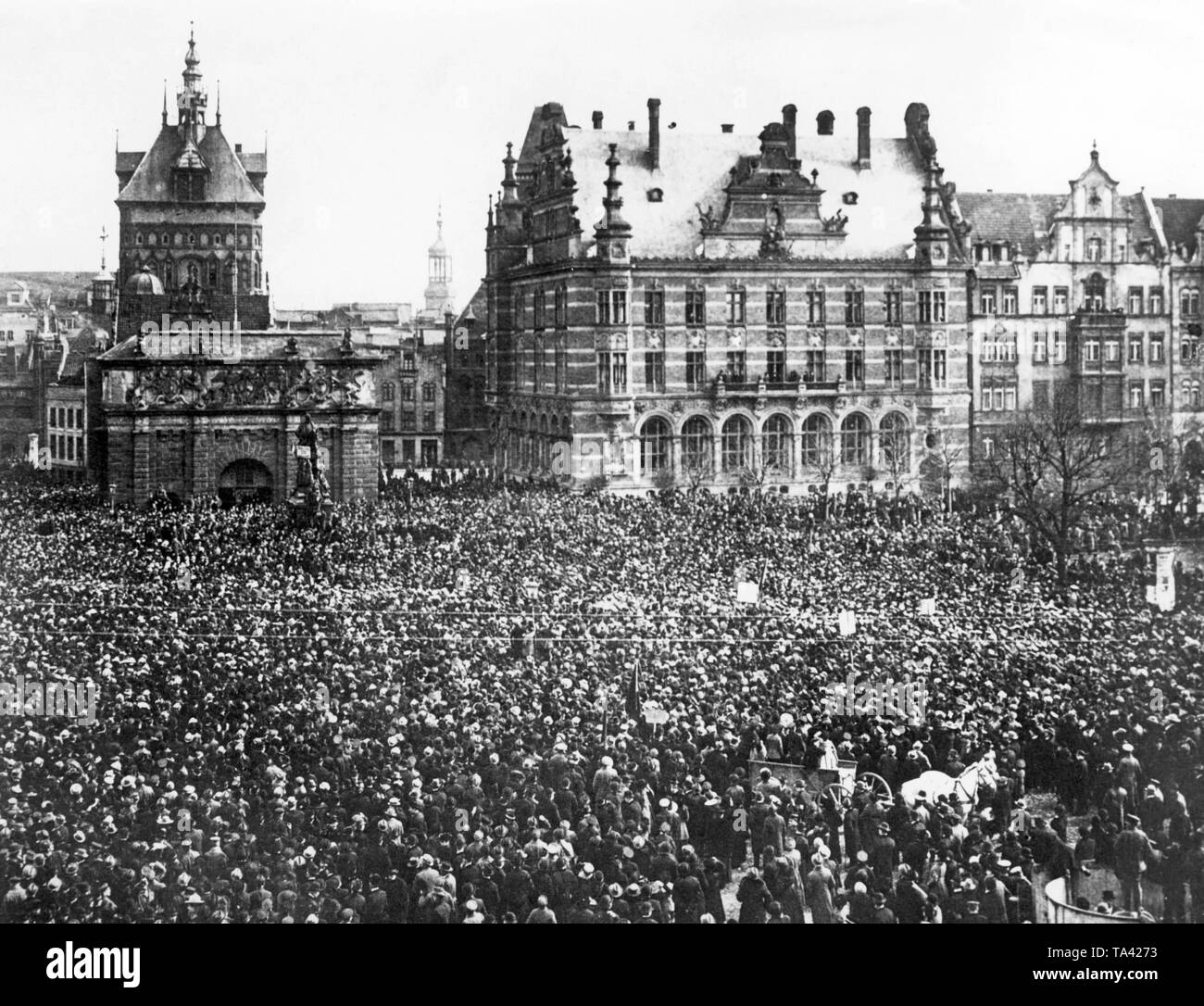 On the Heumarkt in Gdansk, citizens are gathering to protest against Gdansk's cession to Poland. In their eyes this decision of American President Woodrow Wilson, violated the right of peoples to self-determination. A large part of the Gdansk population had a German biographical background. The separation of Gdansk from Germany took place according to regulations of the Versailles Treaty and the League of Nations. Stock Photo