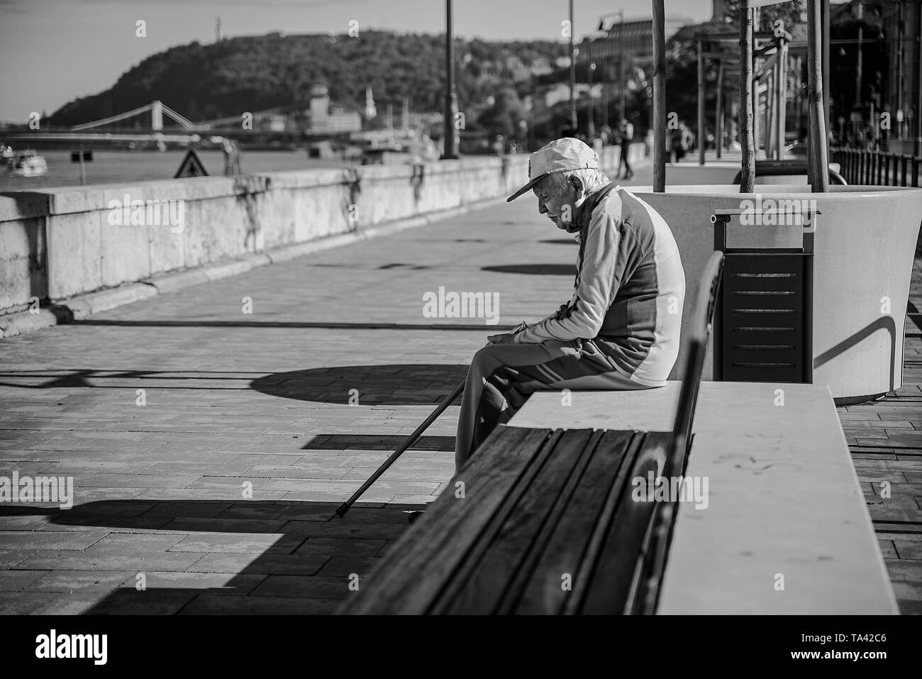 Lonely man bridge river hi-res stock photography and images - Alamy