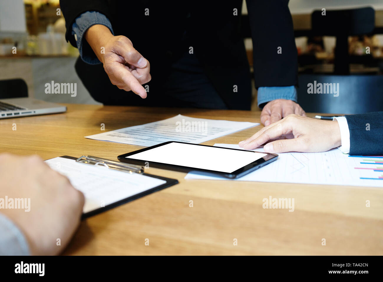 teamwork work in the office meeting and consult about the business
