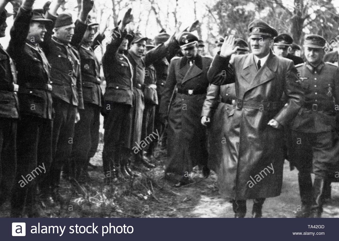Soldiers greet Adolf Hitler with the Nazi salute during his last front  visit to the Oder front in March 1945 Stock Photo - Alamy