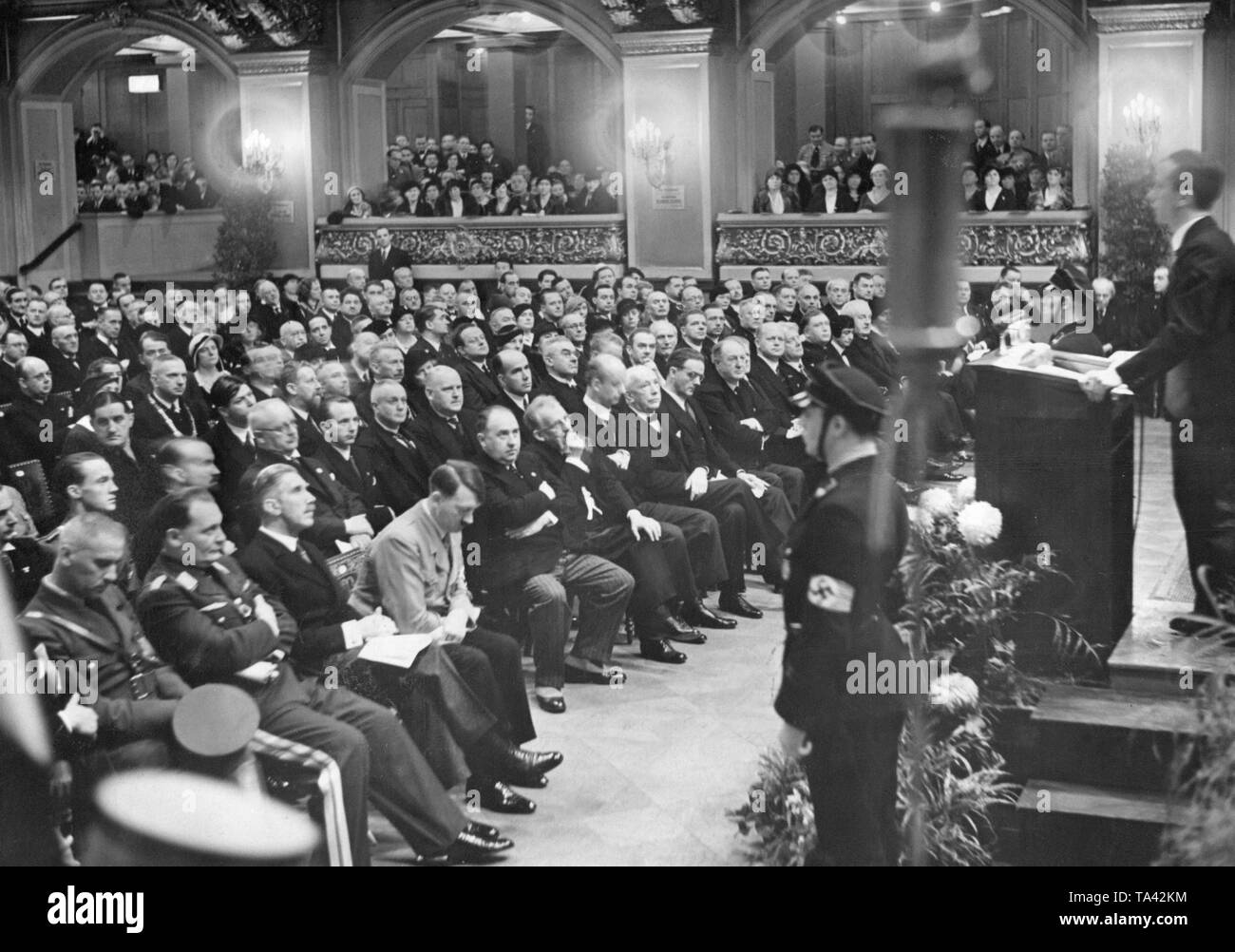 First row from left to right: Hermann Goering, Deputy Chancellor Franz von Papen, exhausted Adolf Hitler, Walther Funk, Hans Pfitzner, Wilhelm Furtwangler, Richard Strauss. Stock Photo