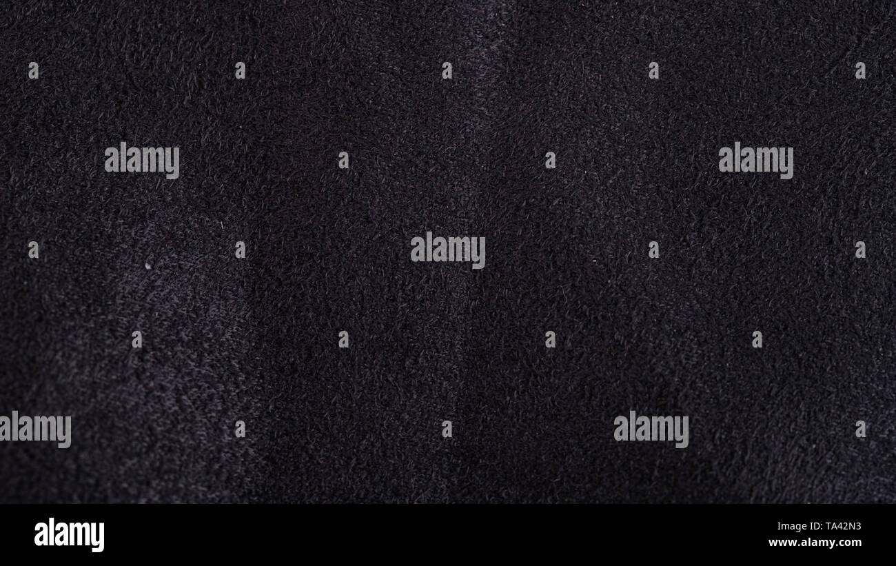 Black suede texture or abstract background. Stock Photo