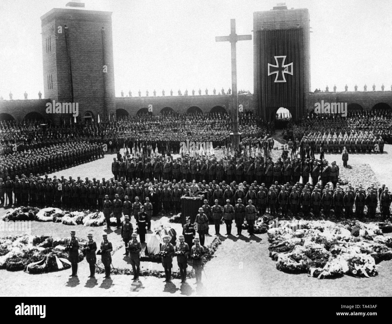 Adolf Hitler at the memorial service for Paul von Hindenburg in the Tannenberg Memorial at Hohenstein in East Prussia. Hitler holds the commemorative speech. Stock Photo