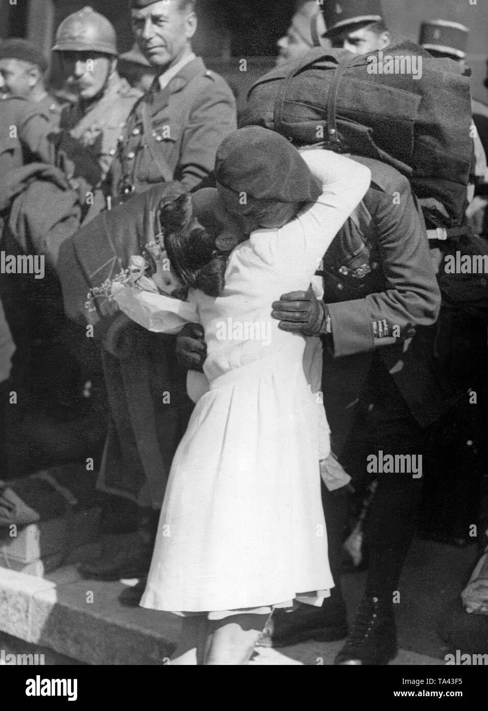 A little girl hugs his father in Sathonay, who was released from prison together with other comrades. Stock Photo