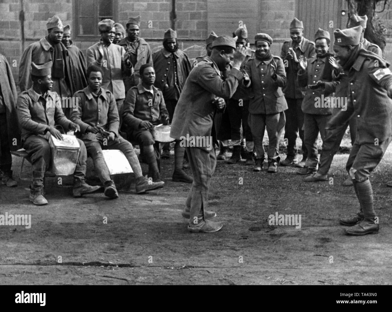 Captured French soldiers of a colonial regiment in a German POW camp during the fighting in France. Stock Photo