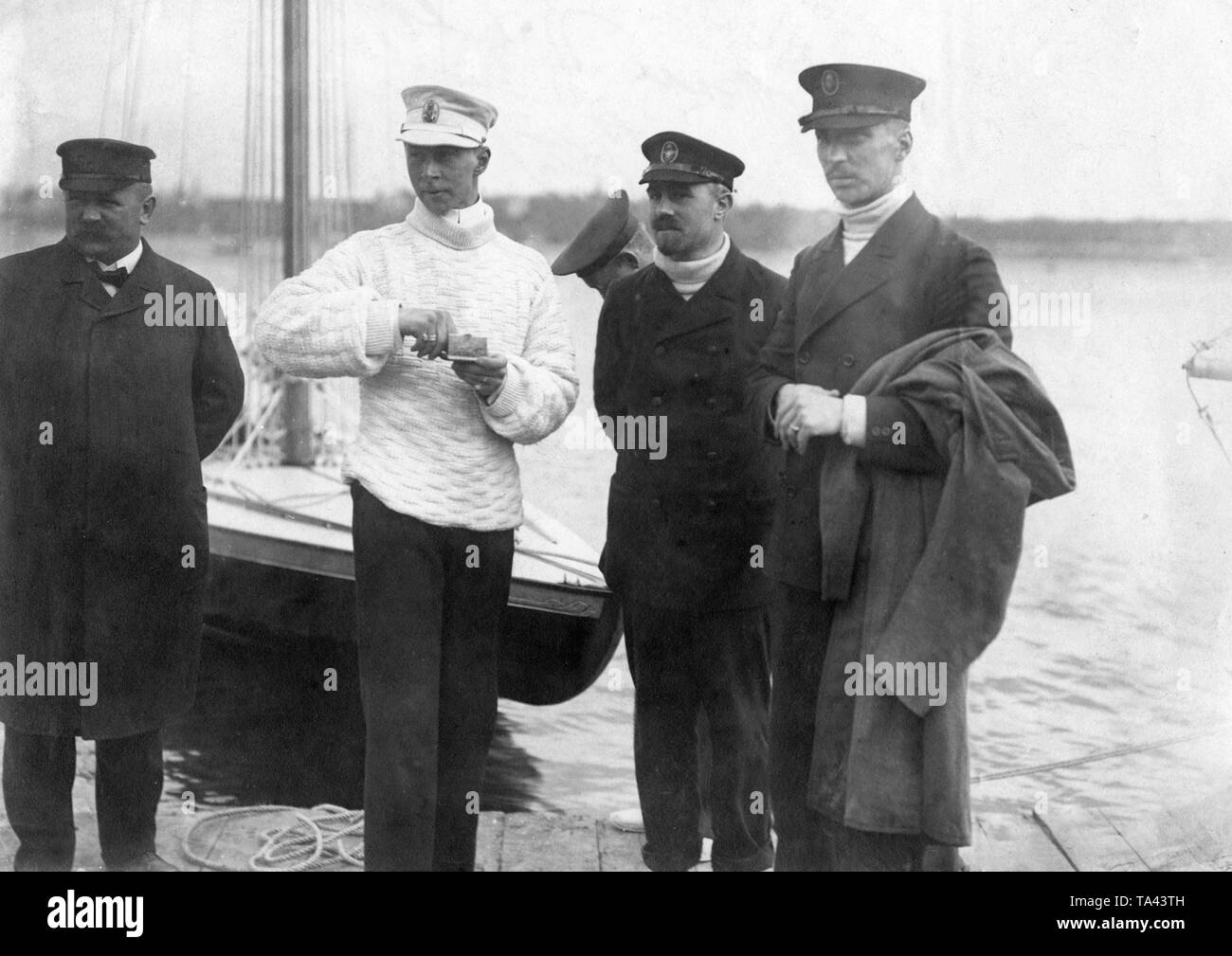 Crown Prince Wilhelm (2nd from left) after a sailing regatta on the Havel. Stock Photo