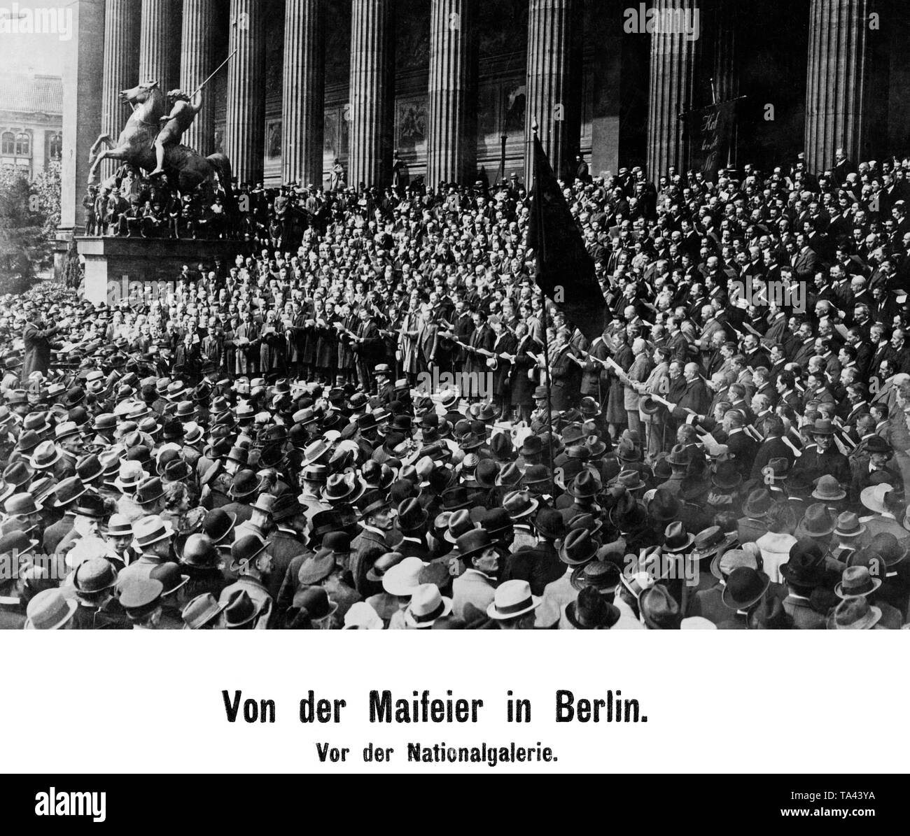 Workers gather on the occasion of May 1 in front of the National Gallery in Berlin. Stock Photo
