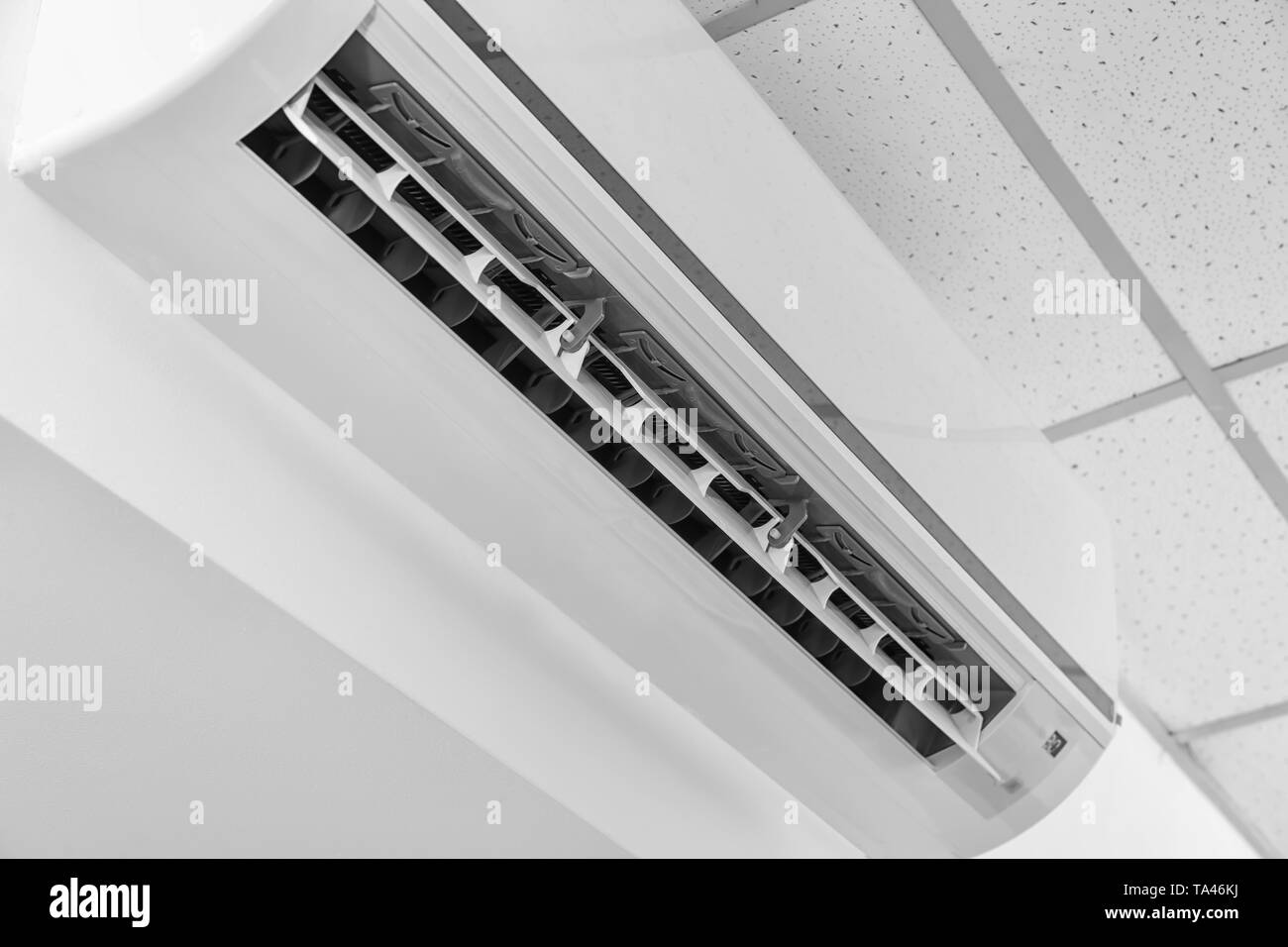 Wall mounted air conditioning Black and White Stock Photos & Images - Alamy