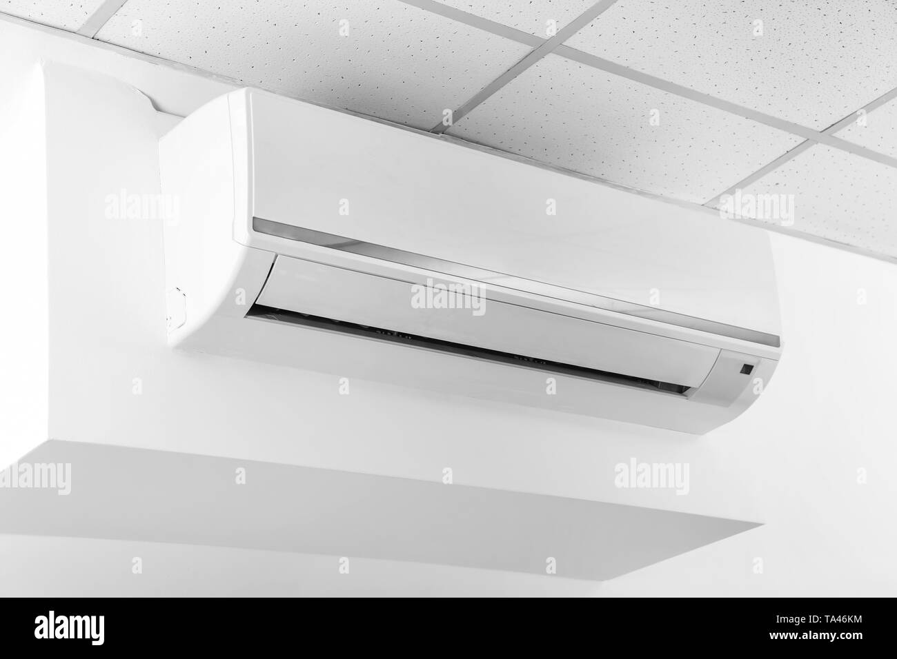 Modern air conditioner on wall Stock Photo - Alamy