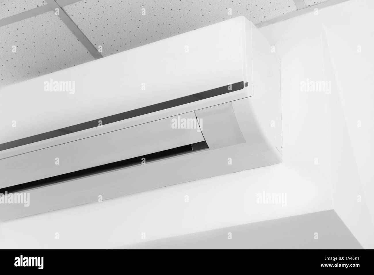 Wall mounted air conditioner Black and White Stock Photos & Images - Alamy