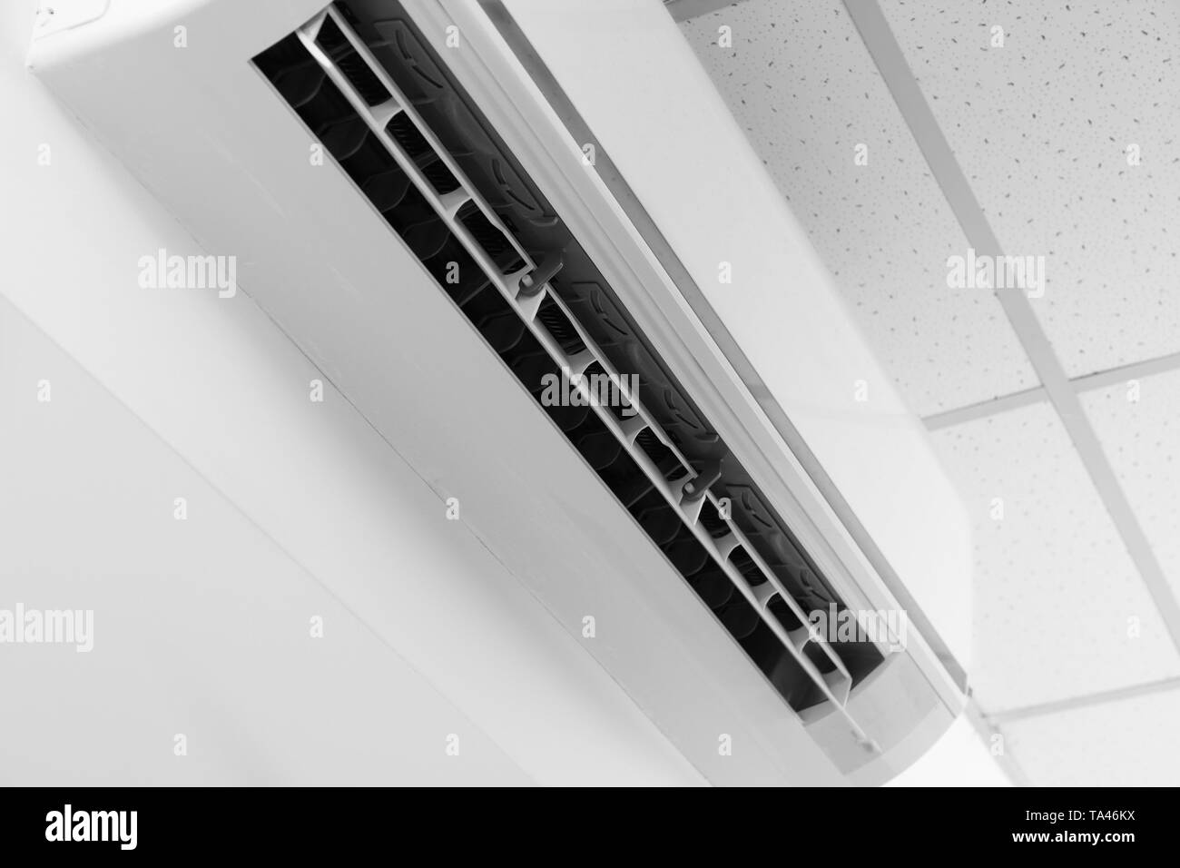 Modern air conditioner on wall Stock Photo - Alamy