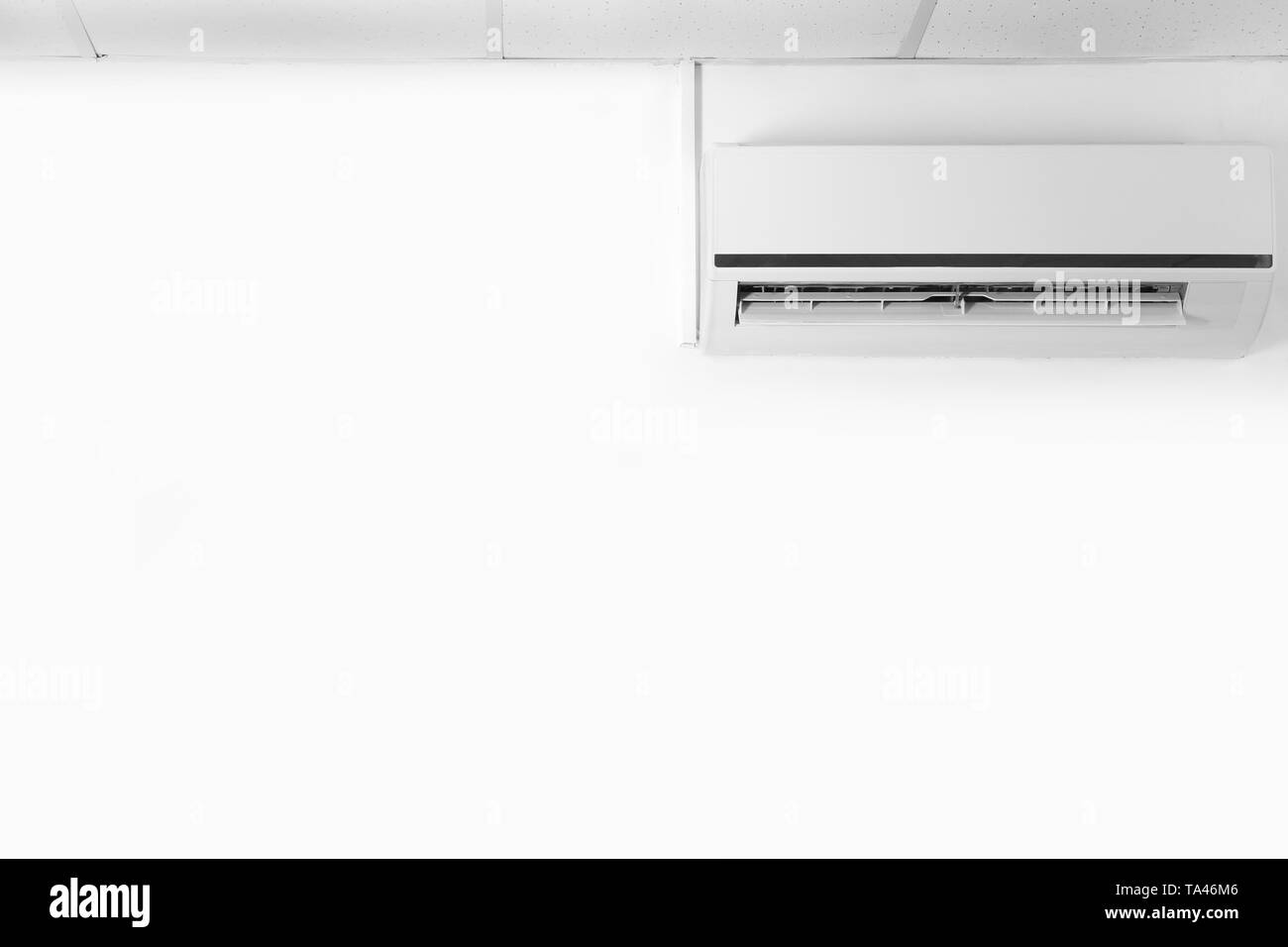Wall mounted air conditioner Black and White Stock Photos & Images - Alamy